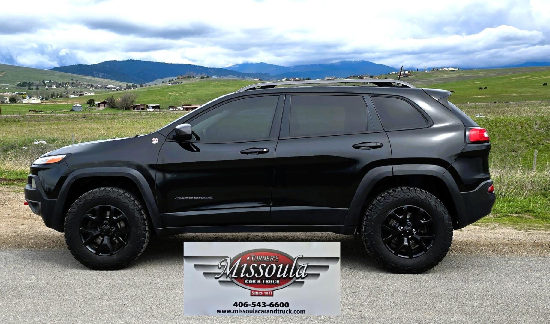 2016 Black /Black Jeep Cherokee Trailhawk 4WD (1C4PJMBS2GW) with an 3.2L V6 DOHC 24V engine, 9A transmission, located at 450 N Russell, Missoula, MT, 59801, (406) 543-6600, 46.874496, -114.017433 - Excellent All Around 4WDSUV. Elegant enough for that night on the town, yet Rugged enough for a trip in the Mountains. 3.2L V6 Engine. 9 Speed Automatic Transmission with option manual shifting. Heated Leather Front Seats. Dual Climate Control. Heated Steering Wheel. Touch Screen AM FM SAT. Bluetoot - Photo#0