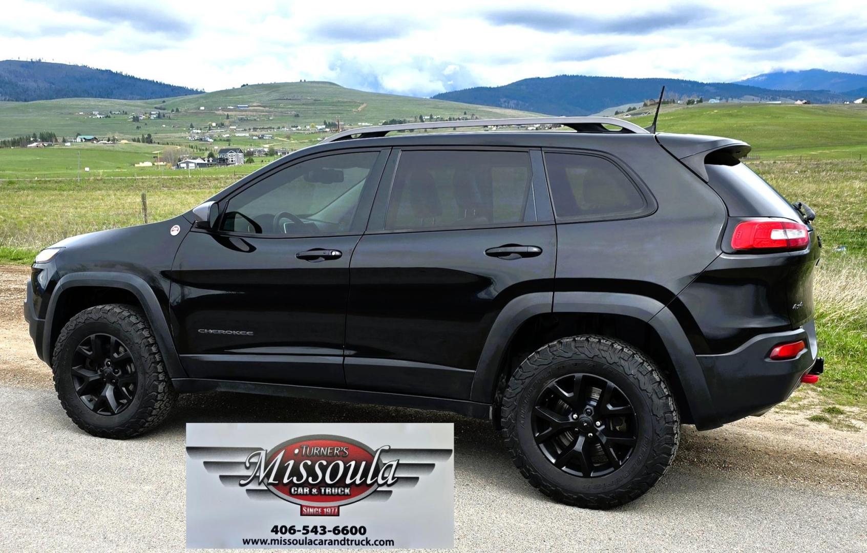 2016 Black /Black Jeep Cherokee Trailhawk 4WD (1C4PJMBS2GW) with an 3.2L V6 DOHC 24V engine, 9A transmission, located at 450 N Russell, Missoula, MT, 59801, (406) 543-6600, 46.874496, -114.017433 - Excellent All Around 4WDSUV. Elegant enough for that night on the town, yet Rugged enough for a trip in the Mountains. 3.2L V6 Engine. 9 Speed Automatic Transmission with option manual shifting. Heated Leather Front Seats. Dual Climate Control. Heated Steering Wheel. Touch Screen AM FM SAT. Bluetoot - Photo#1
