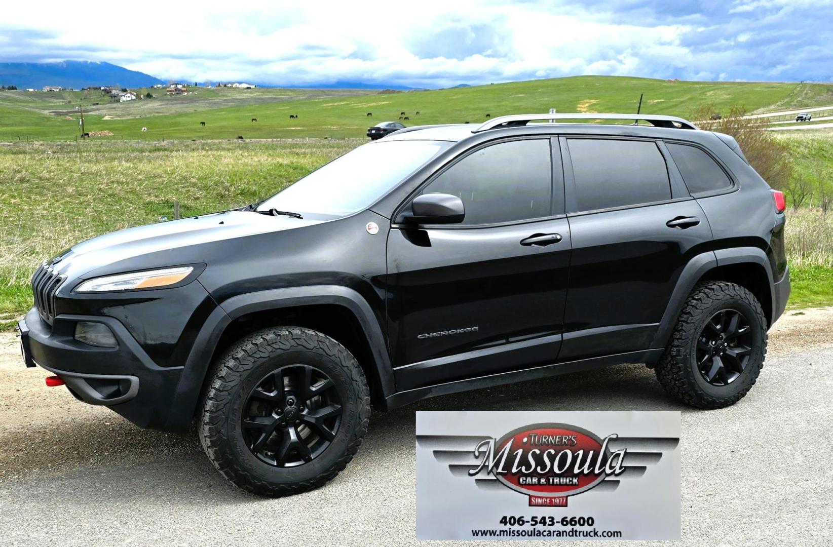 2016 Black /Black Jeep Cherokee Trailhawk 4WD (1C4PJMBS2GW) with an 3.2L V6 DOHC 24V engine, 9A transmission, located at 450 N Russell, Missoula, MT, 59801, (406) 543-6600, 46.874496, -114.017433 - Excellent All Around 4WDSUV. Elegant enough for that night on the town, yet Rugged enough for a trip in the Mountains. 3.2L V6 Engine. 9 Speed Automatic Transmission with option manual shifting. Heated Leather Front Seats. Dual Climate Control. Heated Steering Wheel. Touch Screen AM FM SAT. Bluetoot - Photo#2