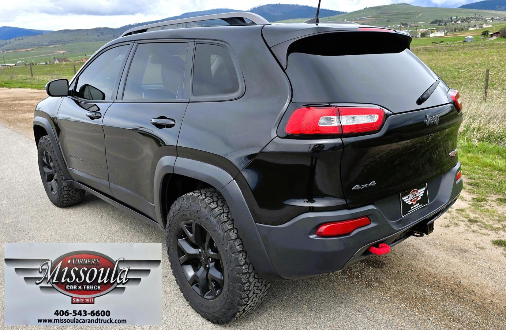 2016 Black /Black Jeep Cherokee Trailhawk 4WD (1C4PJMBS2GW) with an 3.2L V6 DOHC 24V engine, 9A transmission, located at 450 N Russell, Missoula, MT, 59801, (406) 543-6600, 46.874496, -114.017433 - Excellent All Around 4WDSUV. Elegant enough for that night on the town, yet Rugged enough for a trip in the Mountains. 3.2L V6 Engine. 9 Speed Automatic Transmission with option manual shifting. Heated Leather Front Seats. Dual Climate Control. Heated Steering Wheel. Touch Screen AM FM SAT. Bluetoot - Photo#4