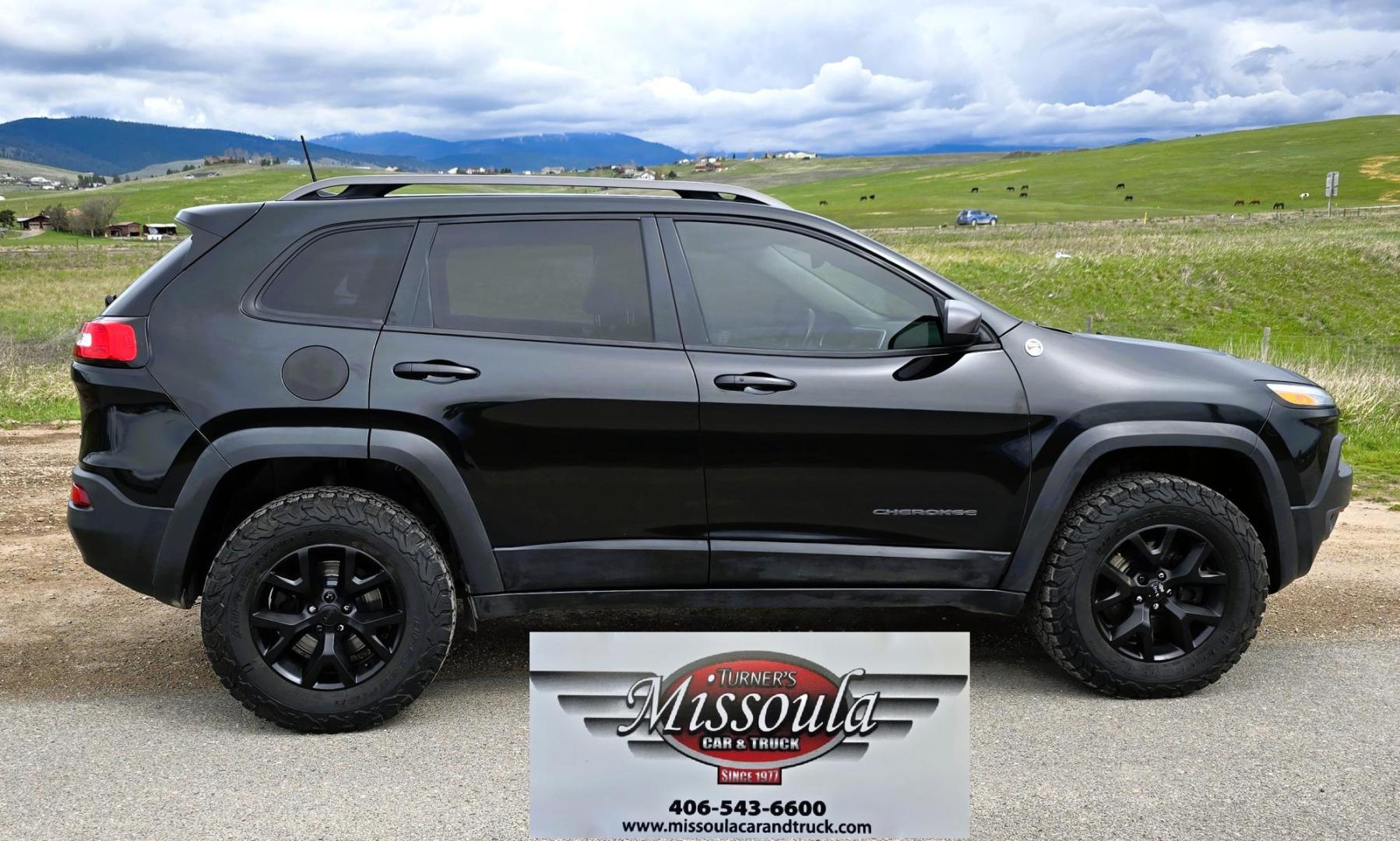 2016 Black /Black Jeep Cherokee Trailhawk 4WD (1C4PJMBS2GW) with an 3.2L V6 DOHC 24V engine, 9A transmission, located at 450 N Russell, Missoula, MT, 59801, (406) 543-6600, 46.874496, -114.017433 - Excellent All Around 4WDSUV. Elegant enough for that night on the town, yet Rugged enough for a trip in the Mountains. 3.2L V6 Engine. 9 Speed Automatic Transmission with option manual shifting. Heated Leather Front Seats. Dual Climate Control. Heated Steering Wheel. Touch Screen AM FM SAT. Bluetoot - Photo#5