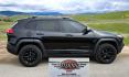 2016 Black /Black Jeep Cherokee Trailhawk 4WD (1C4PJMBS2GW) with an 3.2L V6 DOHC 24V engine, 9A transmission, located at 450 N Russell, Missoula, MT, 59801, (406) 543-6600, 46.874496, -114.017433 - Excellent All Around 4WDSUV. Elegant enough for that night on the town, yet Rugged enough for a trip in the Mountains. 3.2L V6 Engine. 9 Speed Automatic Transmission with option manual shifting. Heated Leather Front Seats. Dual Climate Control. Heated Steering Wheel. Touch Screen AM FM SAT. Bluetoot - Photo#5