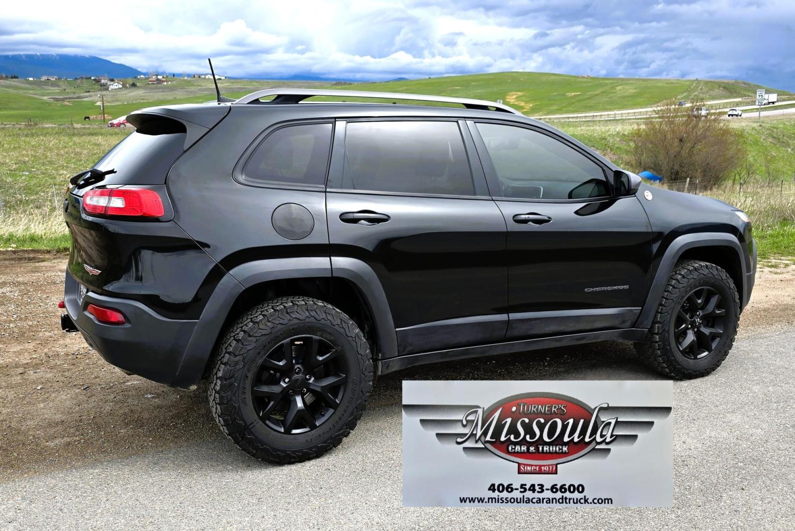 2016 Black /Black Jeep Cherokee Trailhawk 4WD (1C4PJMBS2GW) with an 3.2L V6 DOHC 24V engine, 9A transmission, located at 450 N Russell, Missoula, MT, 59801, (406) 543-6600, 46.874496, -114.017433 - Excellent All Around 4WDSUV. Elegant enough for that night on the town, yet Rugged enough for a trip in the Mountains. 3.2L V6 Engine. 9 Speed Automatic Transmission with option manual shifting. Heated Leather Front Seats. Dual Climate Control. Heated Steering Wheel. Touch Screen AM FM SAT. Bluetoot - Photo#6