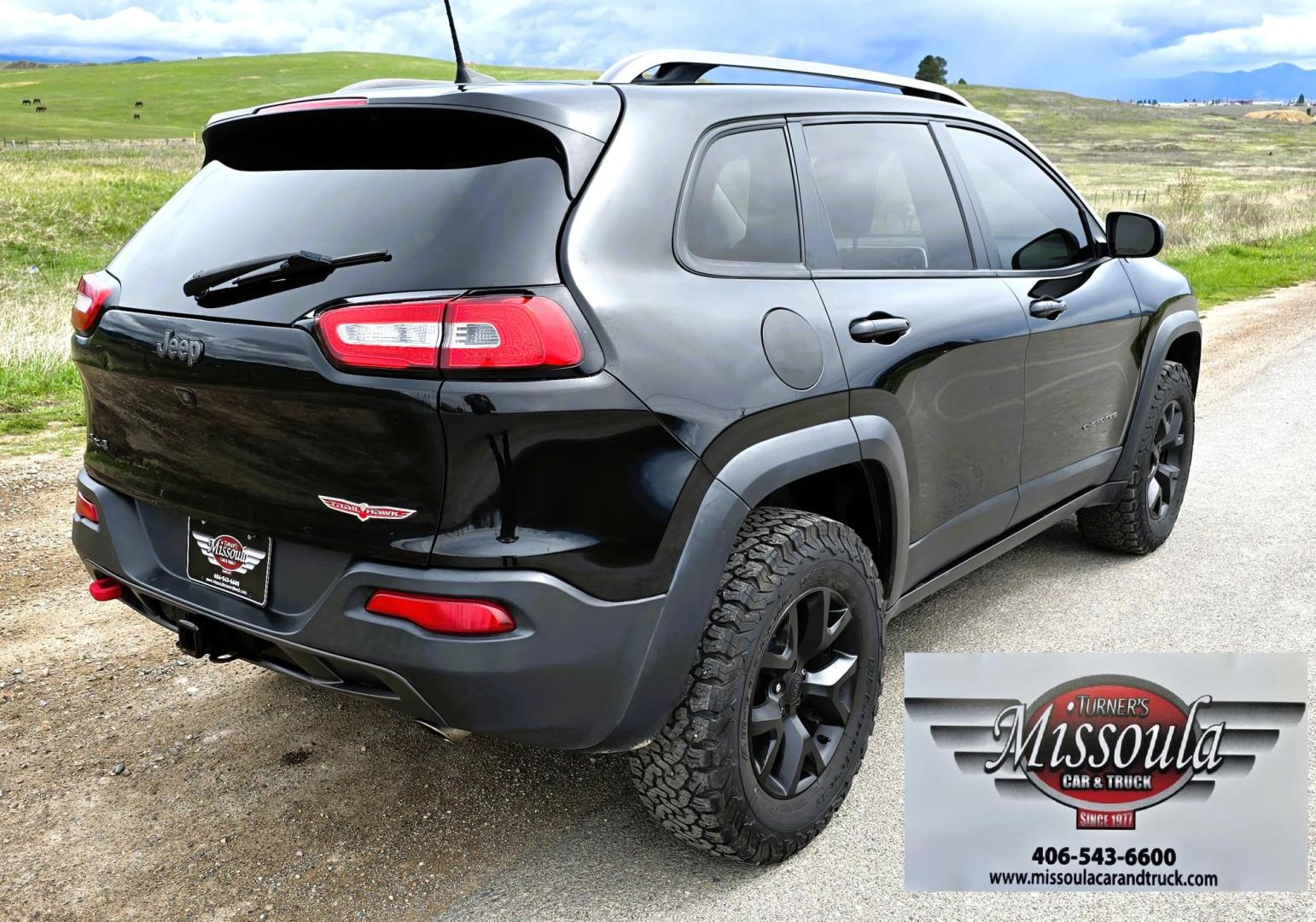 2016 Black /Black Jeep Cherokee Trailhawk 4WD (1C4PJMBS2GW) with an 3.2L V6 DOHC 24V engine, 9A transmission, located at 450 N Russell, Missoula, MT, 59801, (406) 543-6600, 46.874496, -114.017433 - Excellent All Around 4WDSUV. Elegant enough for that night on the town, yet Rugged enough for a trip in the Mountains. 3.2L V6 Engine. 9 Speed Automatic Transmission with option manual shifting. Heated Leather Front Seats. Dual Climate Control. Heated Steering Wheel. Touch Screen AM FM SAT. Bluetoot - Photo#7