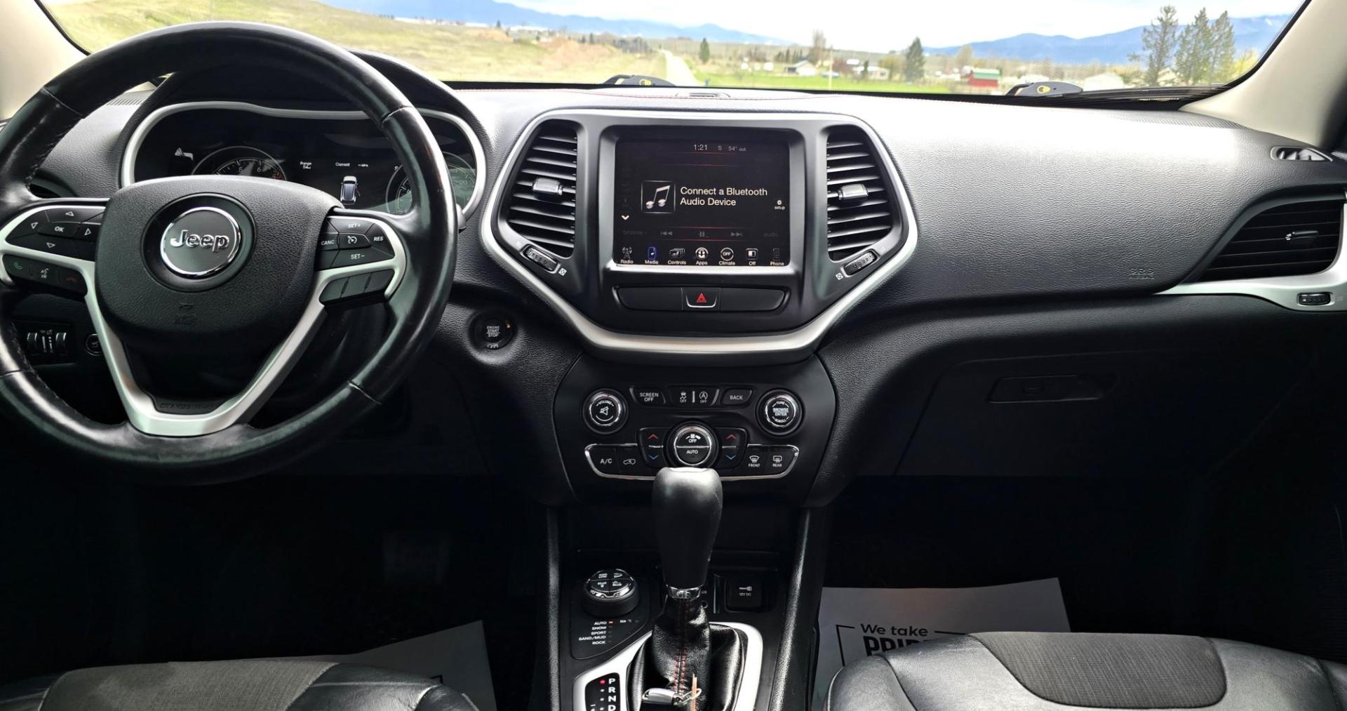 2016 Black /Black Jeep Cherokee Trailhawk 4WD (1C4PJMBS2GW) with an 3.2L V6 DOHC 24V engine, 9A transmission, located at 450 N Russell, Missoula, MT, 59801, (406) 543-6600, 46.874496, -114.017433 - Excellent All Around 4WDSUV. Elegant enough for that night on the town, yet Rugged enough for a trip in the Mountains. 3.2L V6 Engine. 9 Speed Automatic Transmission with option manual shifting. Heated Leather Front Seats. Dual Climate Control. Heated Steering Wheel. Touch Screen AM FM SAT. Bluetoot - Photo#11
