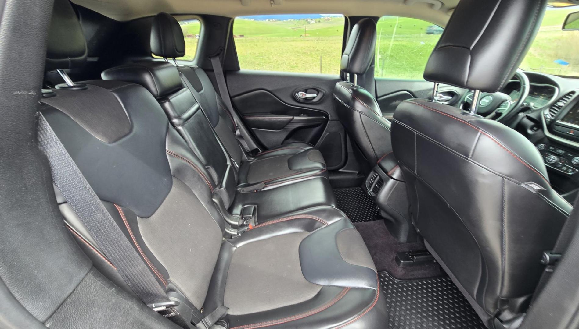 2016 Black /Black Jeep Cherokee Trailhawk 4WD (1C4PJMBS2GW) with an 3.2L V6 DOHC 24V engine, 9A transmission, located at 450 N Russell, Missoula, MT, 59801, (406) 543-6600, 46.874496, -114.017433 - Excellent All Around 4WDSUV. Elegant enough for that night on the town, yet Rugged enough for a trip in the Mountains. 3.2L V6 Engine. 9 Speed Automatic Transmission with option manual shifting. Heated Leather Front Seats. Dual Climate Control. Heated Steering Wheel. Touch Screen AM FM SAT. Bluetoot - Photo#10