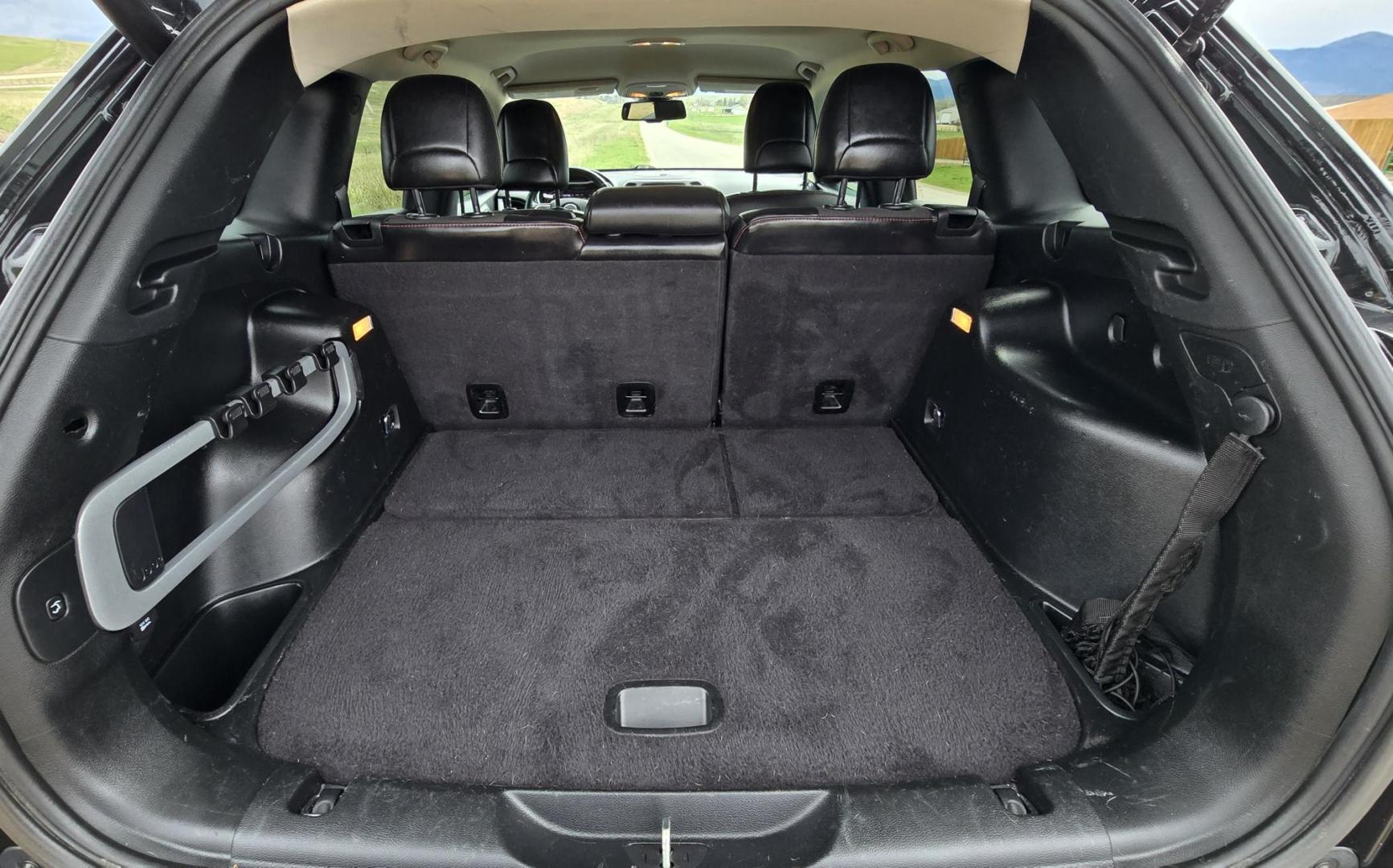 2016 Black /Black Jeep Cherokee Trailhawk 4WD (1C4PJMBS2GW) with an 3.2L V6 DOHC 24V engine, 9A transmission, located at 450 N Russell, Missoula, MT, 59801, (406) 543-6600, 46.874496, -114.017433 - Excellent All Around 4WDSUV. Elegant enough for that night on the town, yet Rugged enough for a trip in the Mountains. 3.2L V6 Engine. 9 Speed Automatic Transmission with option manual shifting. Heated Leather Front Seats. Dual Climate Control. Heated Steering Wheel. Touch Screen AM FM SAT. Bluetoot - Photo#12