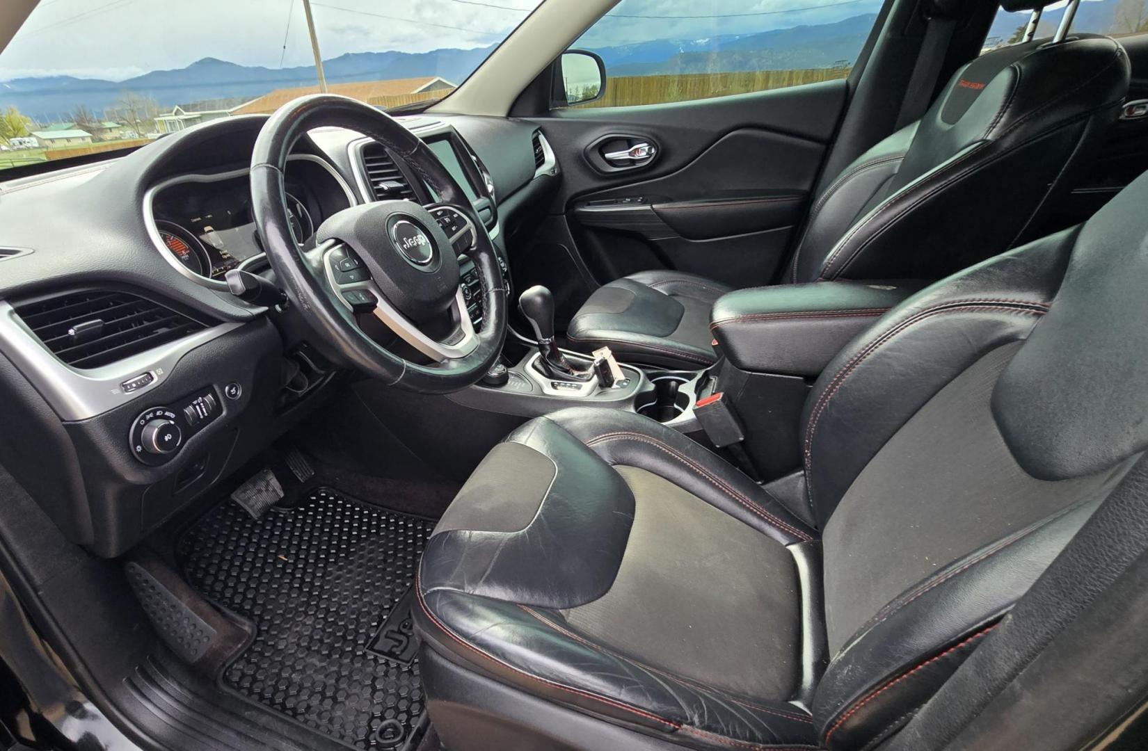 2016 Black /Black Jeep Cherokee Trailhawk 4WD (1C4PJMBS2GW) with an 3.2L V6 DOHC 24V engine, 9A transmission, located at 450 N Russell, Missoula, MT, 59801, (406) 543-6600, 46.874496, -114.017433 - Excellent All Around 4WDSUV. Elegant enough for that night on the town, yet Rugged enough for a trip in the Mountains. 3.2L V6 Engine. 9 Speed Automatic Transmission with option manual shifting. Heated Leather Front Seats. Dual Climate Control. Heated Steering Wheel. Touch Screen AM FM SAT. Bluetoot - Photo#14