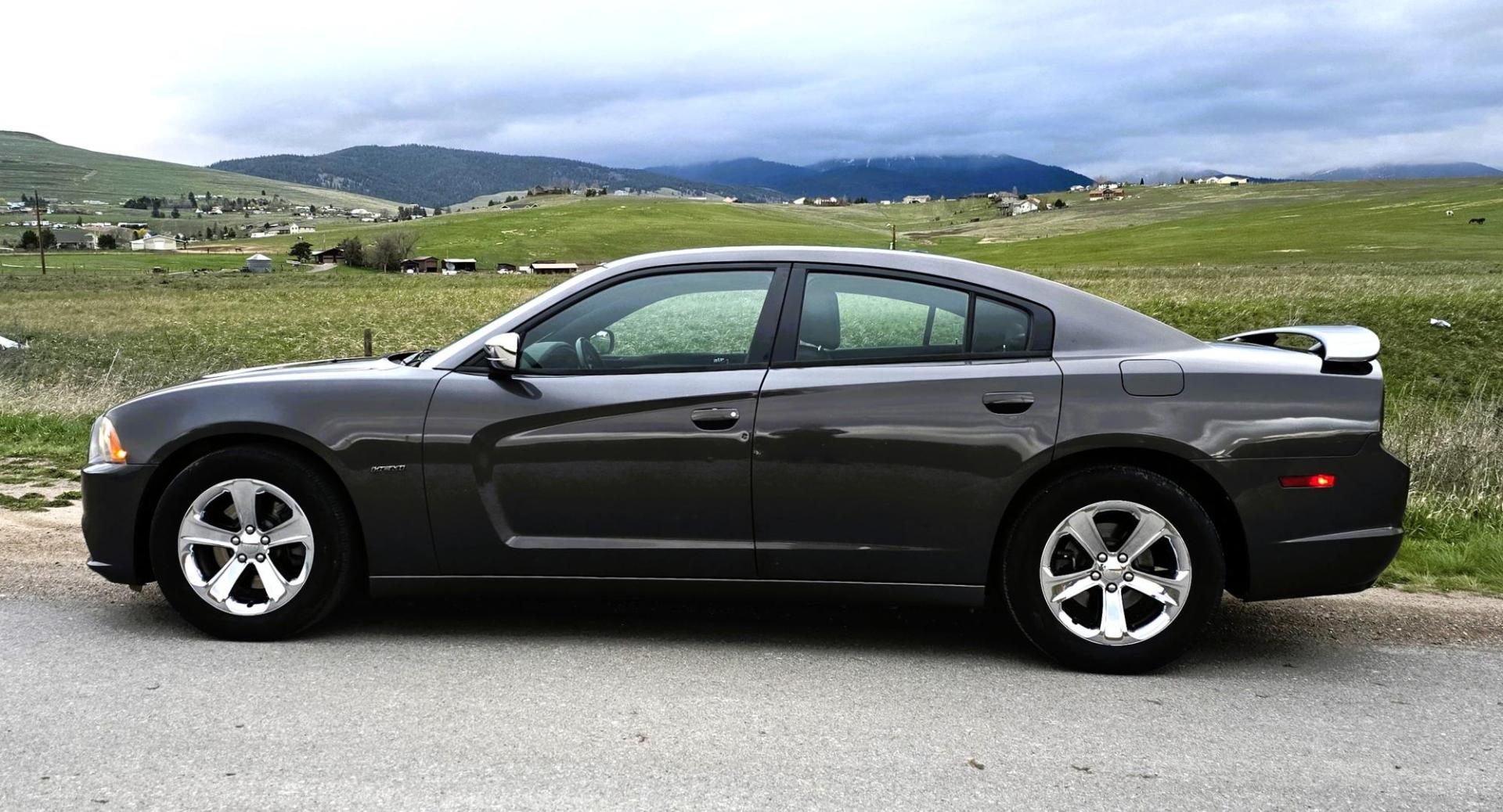 2013 Grey /Black Dodge Charger R/T (2C3CDXCT3DH) with an 5.7L V8 OHV 16V engine, 5-Speed Automatic transmission, located at 450 N Russell, Missoula, MT, 59801, (406) 543-6600, 46.874496, -114.017433 - Yup! It's Got a Hemi. Modern Muscle. Zippy 5.7 V8 Engine. Good Miles for it's age. Leather Package. Front Heated and Cooled Power Seats. Heated Rear Seats. Touch Screen. AM FM SAT. Bluetooth Audio and Phone. Power Windows and Locks. Dual Climate Control. We Finance through local Credit Unions. - Photo#0