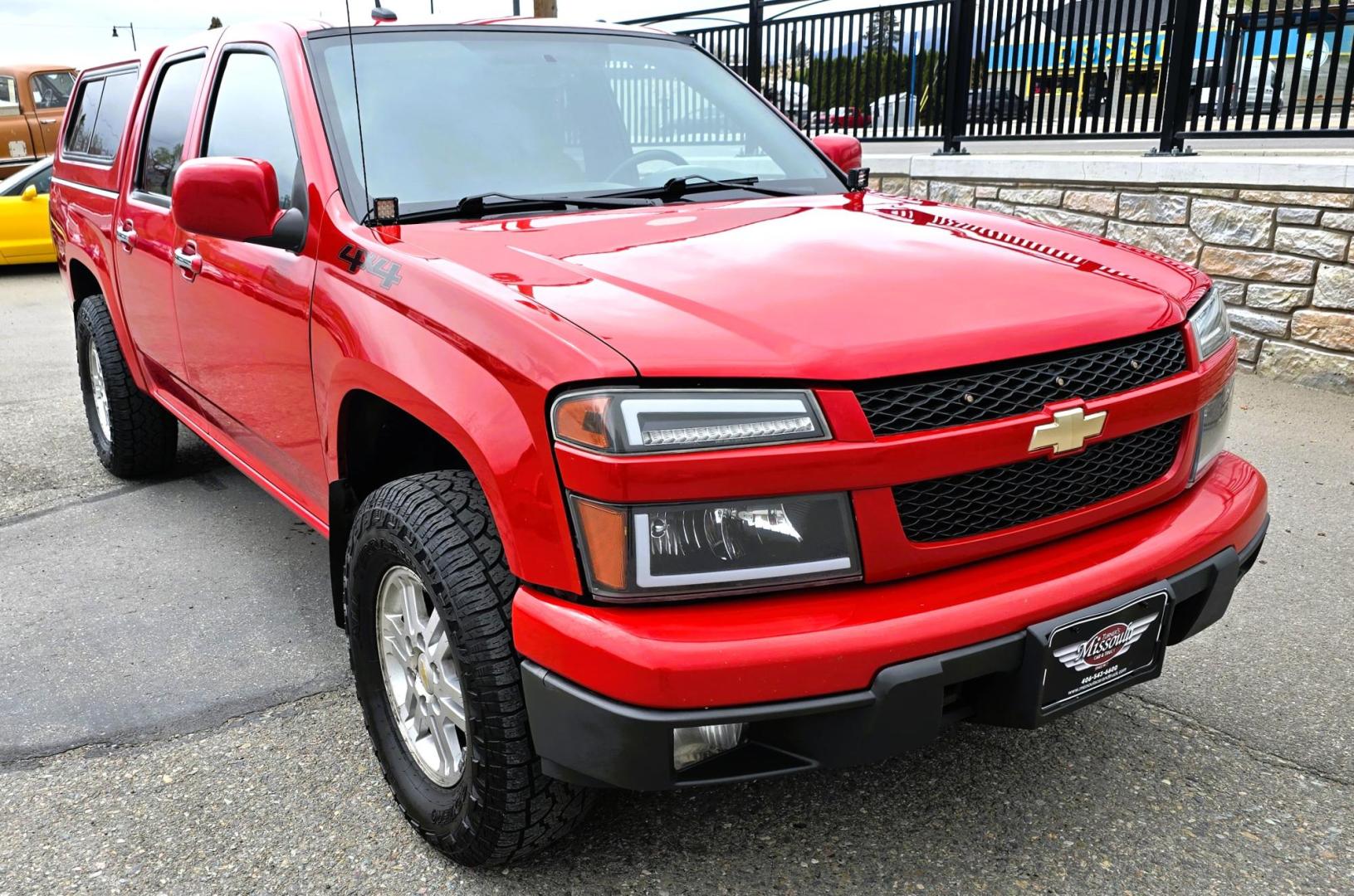 2011 Red /Tan Chevrolet Colorado 1LT Crew Cab 4WD (1GCHTCFE2B8) with an 2.9L L4 DOHC 16V engine, Automatic transmission, located at 450 N Russell, Missoula, MT, 59801, (406) 543-6600, 46.874496, -114.017433 - Yes it has a lot of Miles but come drive it and you will be impressed. 3.7L I5 Engine. Automatic Transmission. Air. Cruise. Tilt. Power Windows and Locks. Matching Topper. Because if the miles. Financing is NOT Available on this vehicle. - Photo#5