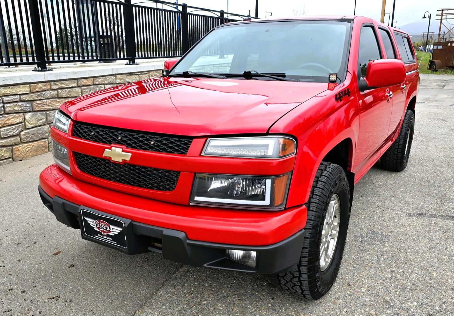 2011 Red /Tan Chevrolet Colorado 1LT Crew Cab 4WD (1GCHTCFE2B8) with an 2.9L L4 DOHC 16V engine, Automatic transmission, located at 450 N Russell, Missoula, MT, 59801, (406) 543-6600, 46.874496, -114.017433 - Yes it has a lot of Miles but come drive it and you will be impressed. 3.7L I5 Engine. Automatic Transmission. Air. Cruise. Tilt. Power Windows and Locks. Matching Topper. Because if the miles. Financing is NOT Available on this vehicle. - Photo#10