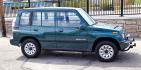 1997 Green Suzuki Sidekick JX 4-Door 4WD (2S3TD03V7V6) with an 1.6L L4 SOHC 16V engine, 5 Speed Manual transmission, located at 450 N Russell, Missoula, MT, 59801, (406) 543-6600, 46.874496, -114.017433 - Photo#0