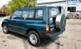 1997 Green Suzuki Sidekick JX 4-Door 4WD (2S3TD03V7V6) with an 1.6L L4 SOHC 16V engine, 5 Speed Manual transmission, located at 450 N Russell, Missoula, MT, 59801, (406) 543-6600, 46.874496, -114.017433 - Photo#8