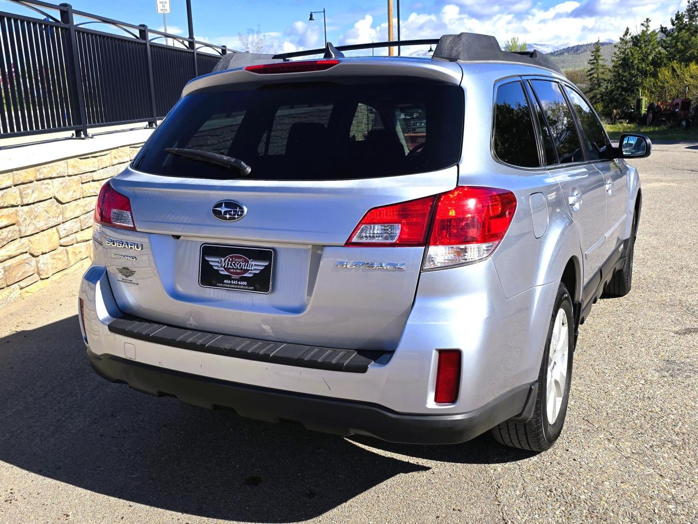 2012 Blue /Black Subaru Outback 2.5i Limited (4S4BRCKC1C3) with an 2.5L H4 DOHC 16V engine, Automatic transmission, located at 450 N Russell, Missoula, MT, 59801, (406) 543-6600, 46.874496, -114.017433 - Clean 2 Owner AWD Outback in Good Condition. We just replaced the Timing Belt, Water Pump, etc.. 2.5L H4 Engine. Automatic Transmission. Power Seats. Heated Front Seats. Power Sunroof. Air. cruise. Tilt. Power Windows and Locks. Backup Camera. AM FM CD Player. Clean Title and Carfax. We Finance - Photo#5