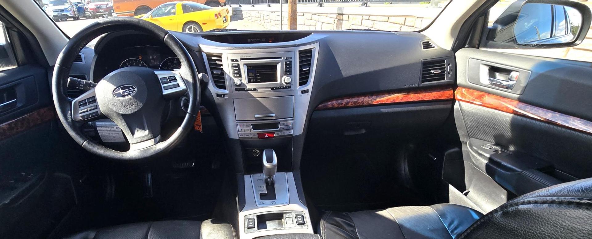 2012 Blue /Black Subaru Outback 2.5i Limited (4S4BRCKC1C3) with an 2.5L H4 DOHC 16V engine, Automatic transmission, located at 450 N Russell, Missoula, MT, 59801, (406) 543-6600, 46.874496, -114.017433 - Clean 2 Owner AWD Outback in Good Condition. We just replaced the Timing Belt, Water Pump, etc.. 2.5L H4 Engine. Automatic Transmission. Power Seats. Heated Front Seats. Power Sunroof. Air. cruise. Tilt. Power Windows and Locks. Backup Camera. AM FM CD Player. Clean Title and Carfax. We Finance - Photo#14