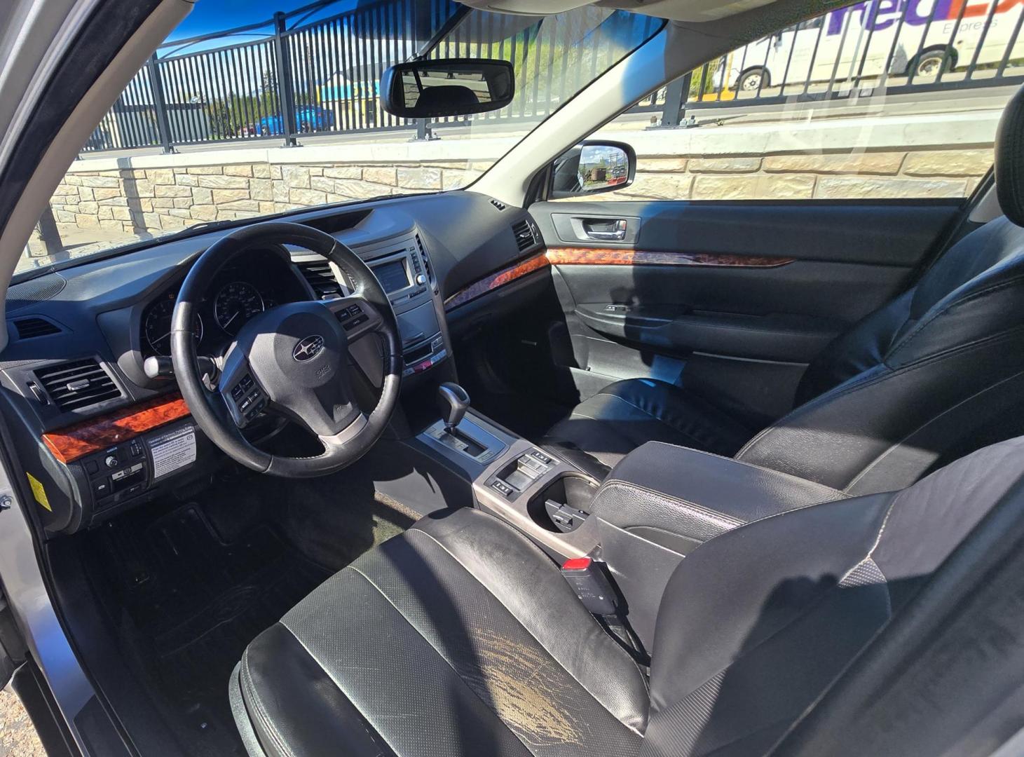 2012 Blue /Black Subaru Outback 2.5i Limited (4S4BRCKC1C3) with an 2.5L H4 DOHC 16V engine, Automatic transmission, located at 450 N Russell, Missoula, MT, 59801, (406) 543-6600, 46.874496, -114.017433 - Clean 2 Owner AWD Outback in Good Condition. We just replaced the Timing Belt, Water Pump, etc.. 2.5L H4 Engine. Automatic Transmission. Power Seats. Heated Front Seats. Power Sunroof. Air. cruise. Tilt. Power Windows and Locks. Backup Camera. AM FM CD Player. Clean Title and Carfax. We Finance - Photo#13