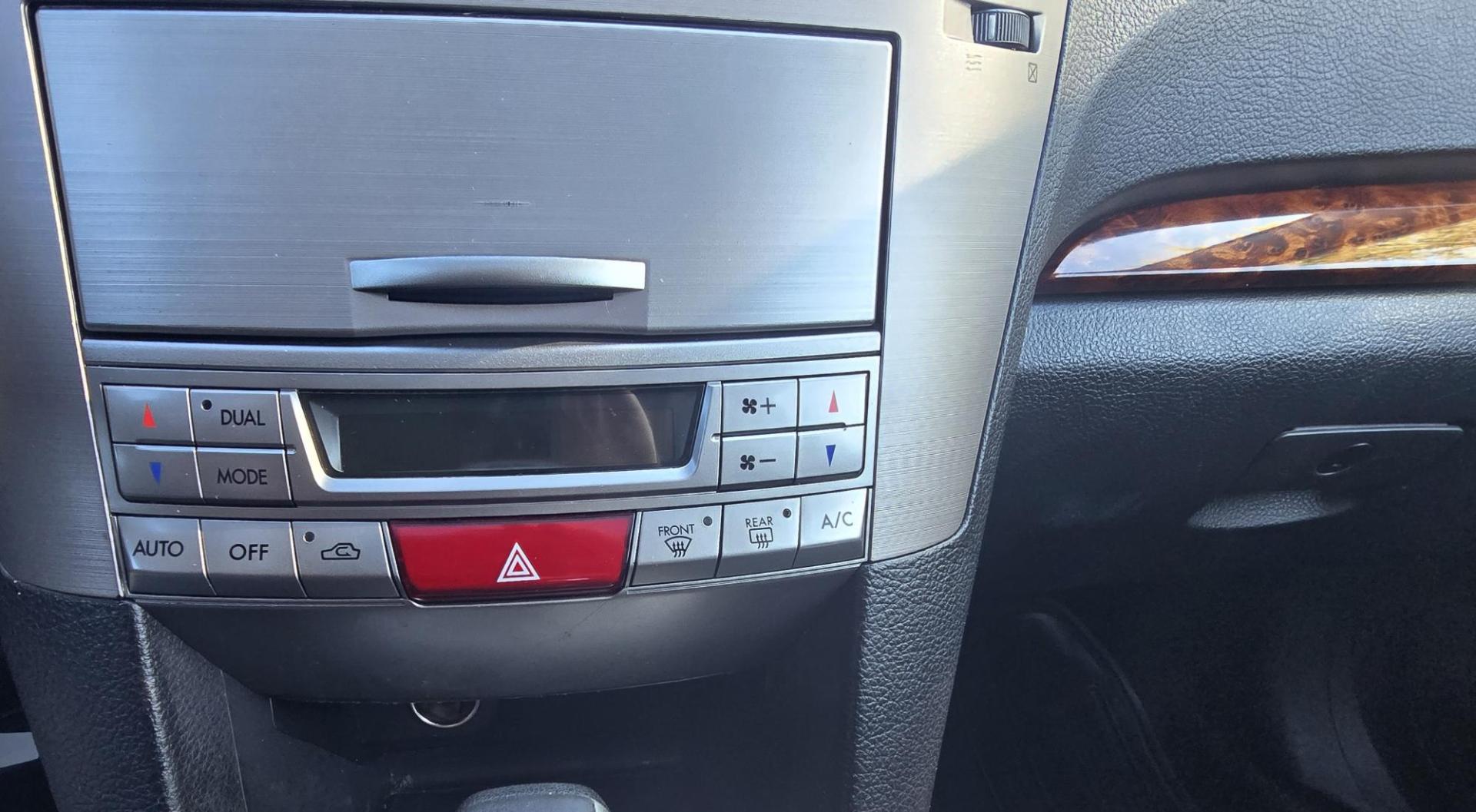 2012 Blue /Black Subaru Outback 2.5i Limited (4S4BRCKC1C3) with an 2.5L H4 DOHC 16V engine, Automatic transmission, located at 450 N Russell, Missoula, MT, 59801, (406) 543-6600, 46.874496, -114.017433 - Clean 2 Owner AWD Outback in Good Condition. We just replaced the Timing Belt, Water Pump, etc.. 2.5L H4 Engine. Automatic Transmission. Power Seats. Heated Front Seats. Power Sunroof. Air. cruise. Tilt. Power Windows and Locks. Backup Camera. AM FM CD Player. Clean Title and Carfax. We Finance - Photo#16