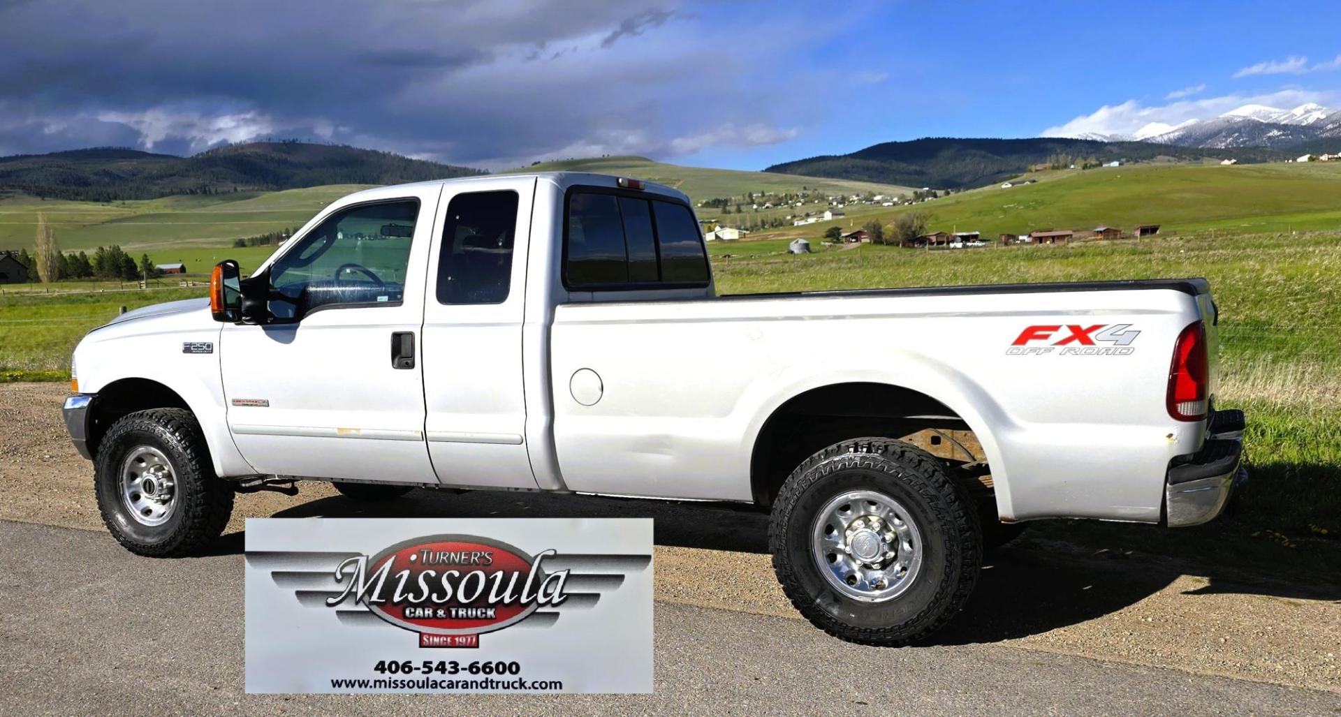 2003 Silver /Gray Ford F-250 SD XLT SuperCab 4WD (1FTNX21P43E) with an 6.0L V8 OHV 32V TURBO DIESEL engine, 6 Speed Manual transmission, located at 450 N Russell, Missoula, MT, 59801, (406) 543-6600, 46.874496, -114.017433 - Practically a Unicorn. 2 Owner Long Box 6.0 PowerStroke Diesel with a 6 Speed Manual Transmission. The Ultimate Work Truck. Power Drivers Seat. Air. Cruise. Tilt. Power Windows and Locks. Excellent Tires. AM FM CD Changer. Because of the age, our lenders do NOT offer financing on this vehicle. - Photo#2