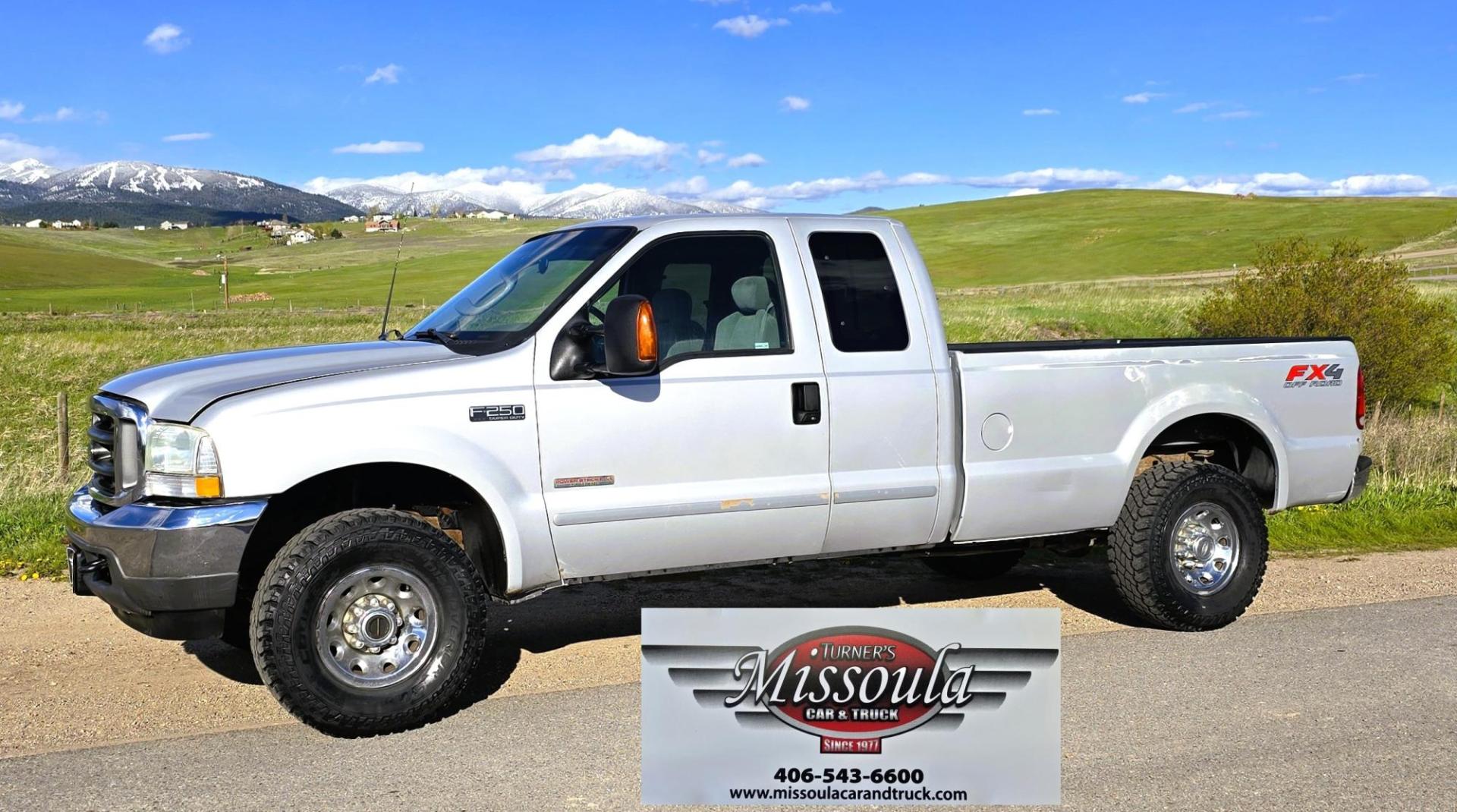 2003 Silver /Gray Ford F-250 SD XLT SuperCab 4WD (1FTNX21P43E) with an 6.0L V8 OHV 32V TURBO DIESEL engine, 6 Speed Manual transmission, located at 450 N Russell, Missoula, MT, 59801, (406) 543-6600, 46.874496, -114.017433 - Practically a Unicorn. 2 Owner Long Box 6.0 PowerStroke Diesel with a 6 Speed Manual Transmission. The Ultimate Work Truck. Power Drivers Seat. Air. Cruise. Tilt. Power Windows and Locks. Excellent Tires. AM FM CD Changer. Because of the age, our lenders do NOT offer financing on this vehicle. - Photo#1