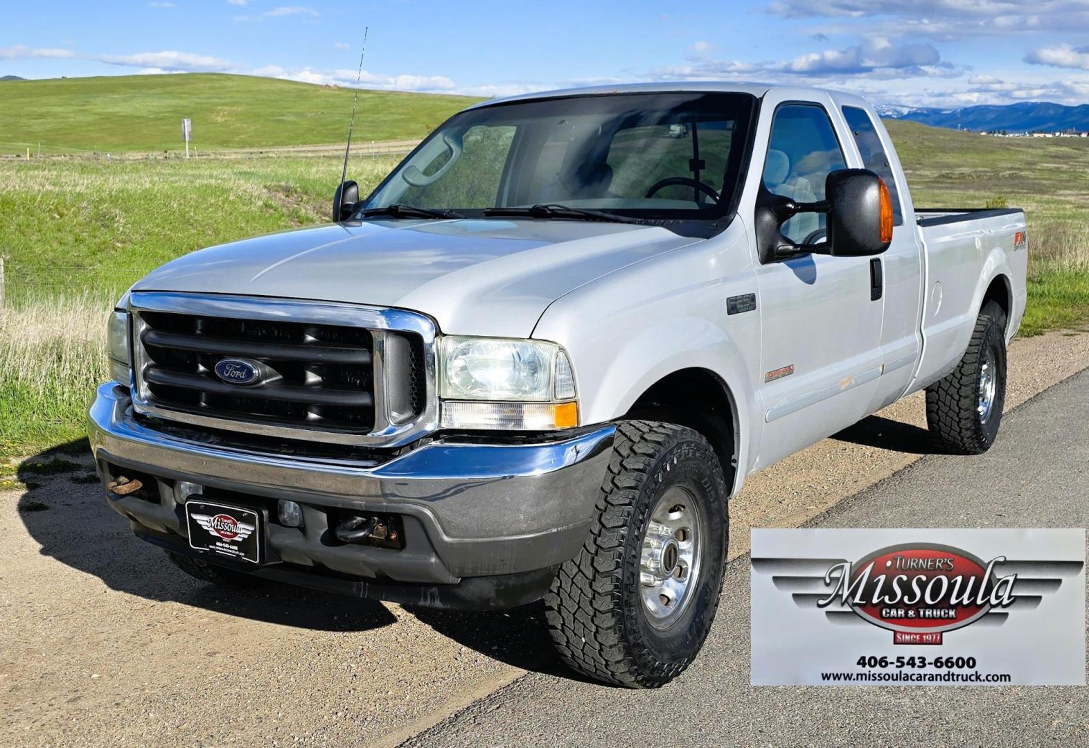 2003 Silver /Gray Ford F-250 SD XLT SuperCab 4WD (1FTNX21P43E) with an 6.0L V8 OHV 32V TURBO DIESEL engine, 6 Speed Manual transmission, located at 450 N Russell, Missoula, MT, 59801, (406) 543-6600, 46.874496, -114.017433 - Practically a Unicorn. 2 Owner Long Box 6.0 PowerStroke Diesel with a 6 Speed Manual Transmission. The Ultimate Work Truck. Power Drivers Seat. Air. Cruise. Tilt. Power Windows and Locks. Excellent Tires. AM FM CD Changer. Because of the age, our lenders do NOT offer financing on this vehicle. - Photo#4