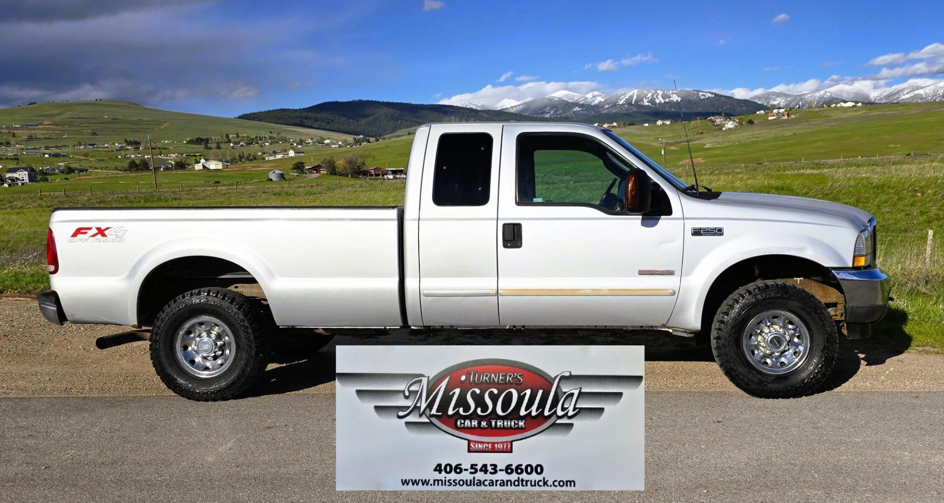 2003 Silver /Gray Ford F-250 SD XLT SuperCab 4WD (1FTNX21P43E) with an 6.0L V8 OHV 32V TURBO DIESEL engine, 6 Speed Manual transmission, located at 450 N Russell, Missoula, MT, 59801, (406) 543-6600, 46.874496, -114.017433 - Practically a Unicorn. 2 Owner Long Box 6.0 PowerStroke Diesel with a 6 Speed Manual Transmission. The Ultimate Work Truck. Power Drivers Seat. Air. Cruise. Tilt. Power Windows and Locks. Excellent Tires. AM FM CD Changer. Because of the age, our lenders do NOT offer financing on this vehicle. - Photo#5