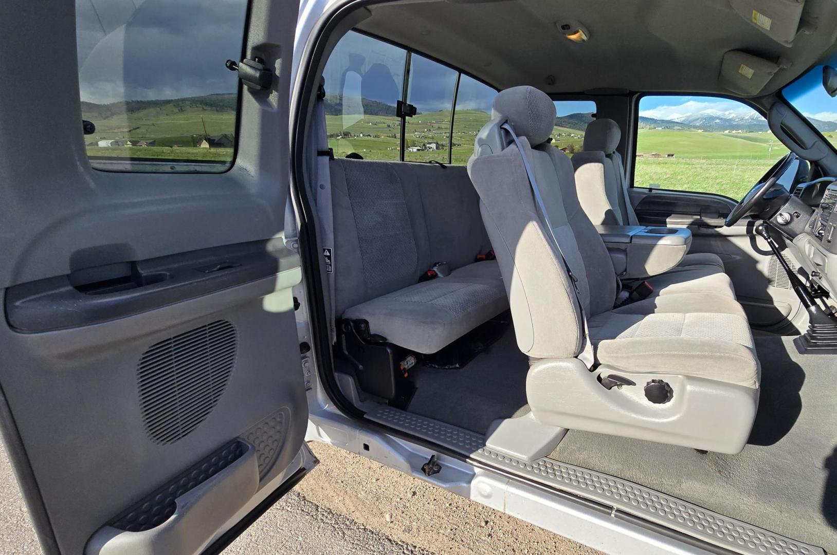 2003 Silver /Gray Ford F-250 SD XLT SuperCab 4WD (1FTNX21P43E) with an 6.0L V8 OHV 32V TURBO DIESEL engine, 6 Speed Manual transmission, located at 450 N Russell, Missoula, MT, 59801, (406) 543-6600, 46.874496, -114.017433 - Practically a Unicorn. 2 Owner Long Box 6.0 PowerStroke Diesel with a 6 Speed Manual Transmission. The Ultimate Work Truck. Power Drivers Seat. Air. Cruise. Tilt. Power Windows and Locks. Excellent Tires. AM FM CD Changer. Because of the age, our lenders do NOT offer financing on this vehicle. - Photo#14