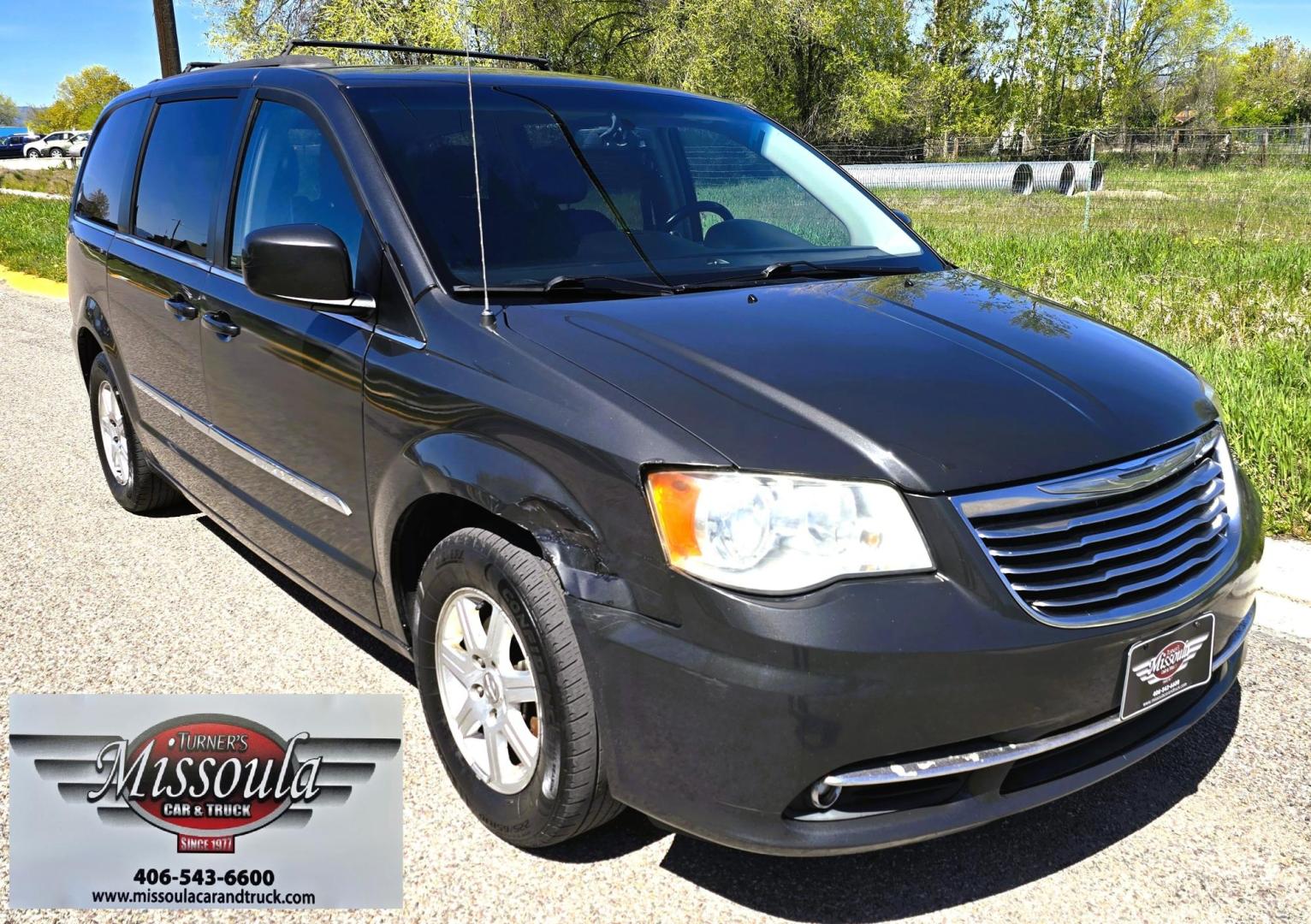 2012 Blue /Black Chrysler Town & Country Touring (2C4RC1BG5CR) with an 3.6L V6 DOHC 24V engine, 6-Speed Automatic transmission, located at 450 N Russell, Missoula, MT, 59801, (406) 543-6600, 46.874496, -114.017433 - Excellent Running Mini-Van. Zippy 3.6L V6 Engine. 6 Speed Automatic Transmission. 3rd Row Seating. Air. Cruise. Tilt. Power Windows and Locks. Rear Entertainment. Power Sliding Doors. Power Drivers Seat. AM FM SAT Touch Screen.Bluetooth Audio and Phone. Backup Camera. One small dent in the right fro - Photo#4