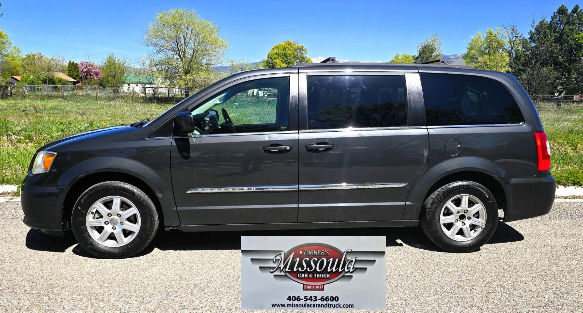2012 Blue /Black Chrysler Town & Country Touring (2C4RC1BG5CR) with an 3.6L V6 DOHC 24V engine, 6-Speed Automatic transmission, located at 450 N Russell, Missoula, MT, 59801, (406) 543-6600, 46.874496, -114.017433 - Excellent Running Mini-Van. Zippy 3.6L V6 Engine. 6 Speed Automatic Transmission. 3rd Row Seating. Air. Cruise. Tilt. Power Windows and Locks. Rear Entertainment. Power Sliding Doors. Power Drivers Seat. AM FM SAT Touch Screen.Bluetooth Audio and Phone. Backup Camera. One small dent in the right fro - Photo#5