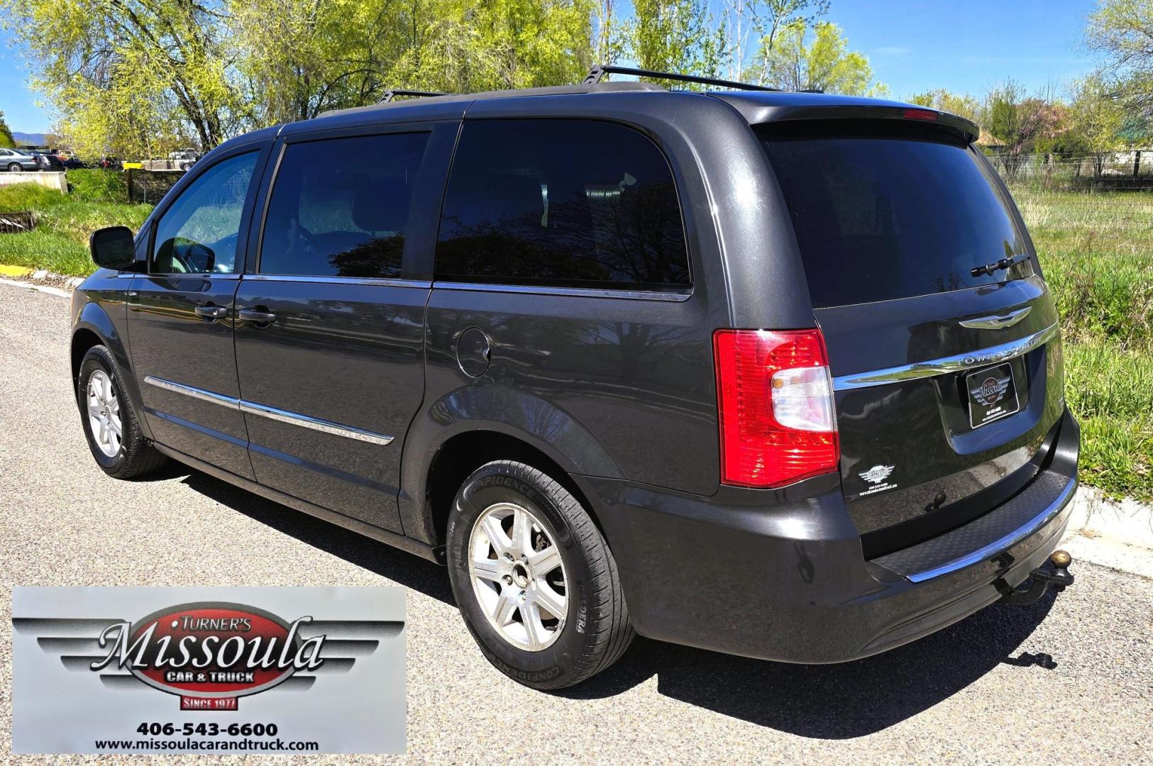 2012 Blue /Black Chrysler Town & Country Touring (2C4RC1BG5CR) with an 3.6L V6 DOHC 24V engine, 6-Speed Automatic transmission, located at 450 N Russell, Missoula, MT, 59801, (406) 543-6600, 46.874496, -114.017433 - Excellent Running Mini-Van. Zippy 3.6L V6 Engine. 6 Speed Automatic Transmission. 3rd Row Seating. Air. Cruise. Tilt. Power Windows and Locks. Rear Entertainment. Power Sliding Doors. Power Drivers Seat. AM FM SAT Touch Screen.Bluetooth Audio and Phone. Backup Camera. One small dent in the right fro - Photo#7