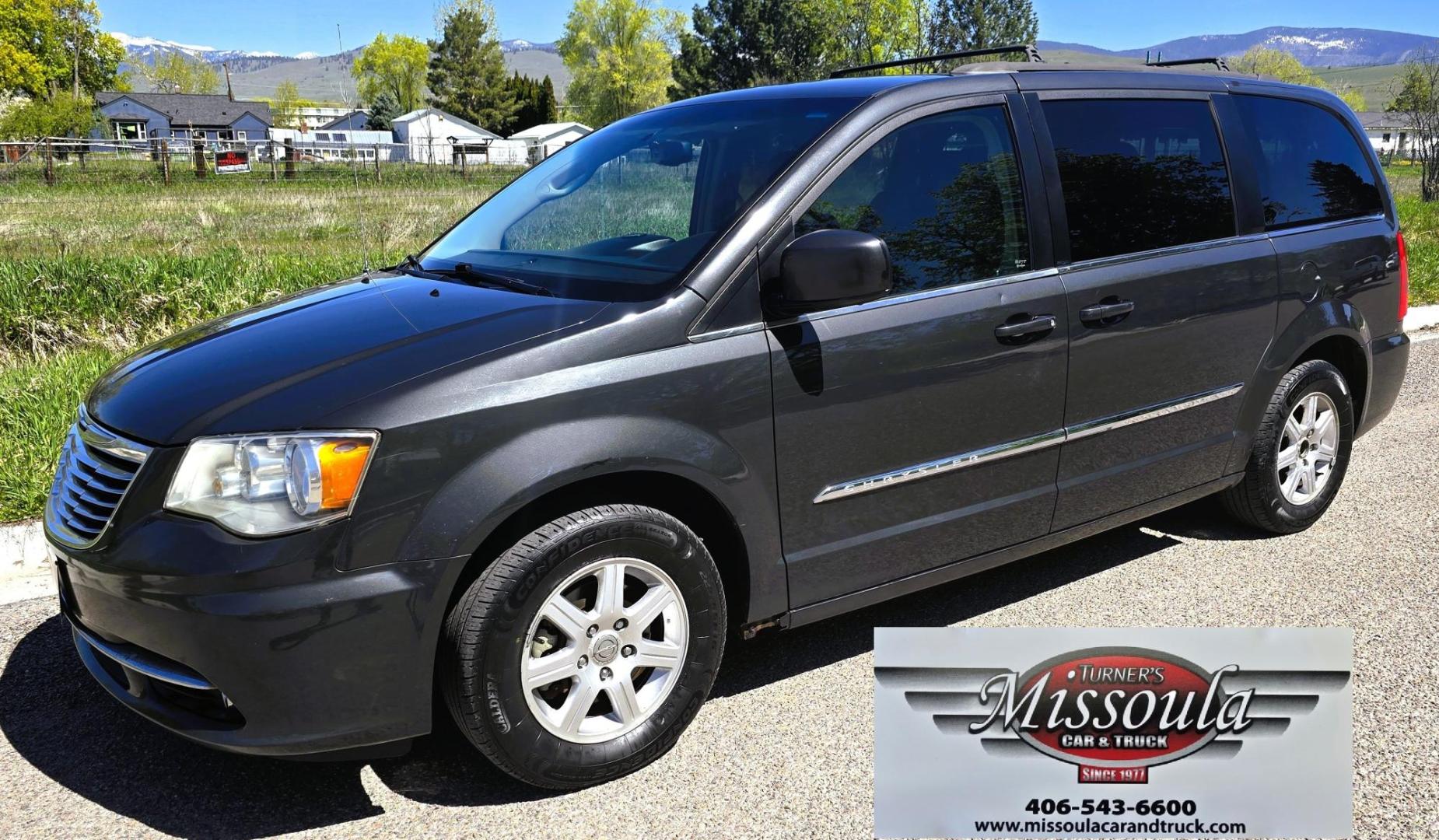 2012 Blue /Black Chrysler Town & Country Touring (2C4RC1BG5CR) with an 3.6L V6 DOHC 24V engine, 6-Speed Automatic transmission, located at 450 N Russell, Missoula, MT, 59801, (406) 543-6600, 46.874496, -114.017433 - Excellent Running Mini-Van. Zippy 3.6L V6 Engine. 6 Speed Automatic Transmission. 3rd Row Seating. Air. Cruise. Tilt. Power Windows and Locks. Rear Entertainment. Power Sliding Doors. Power Drivers Seat. AM FM SAT Touch Screen.Bluetooth Audio and Phone. Backup Camera. One small dent in the right fro - Photo#8