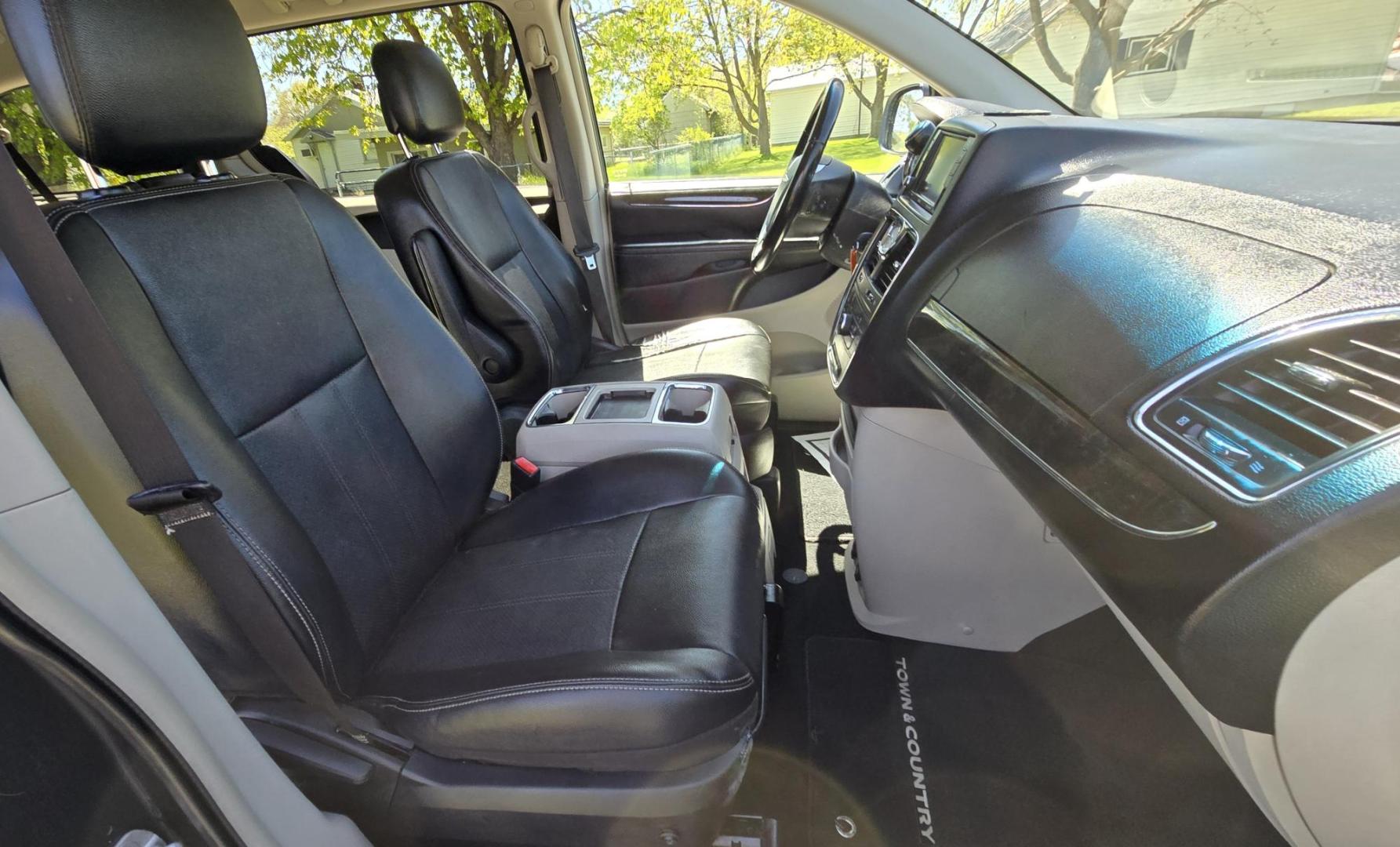 2012 Blue /Black Chrysler Town & Country Touring (2C4RC1BG5CR) with an 3.6L V6 DOHC 24V engine, 6-Speed Automatic transmission, located at 450 N Russell, Missoula, MT, 59801, (406) 543-6600, 46.874496, -114.017433 - Excellent Running Mini-Van. Zippy 3.6L V6 Engine. 6 Speed Automatic Transmission. 3rd Row Seating. Air. Cruise. Tilt. Power Windows and Locks. Rear Entertainment. Power Sliding Doors. Power Drivers Seat. AM FM SAT Touch Screen.Bluetooth Audio and Phone. Backup Camera. One small dent in the right fro - Photo#14