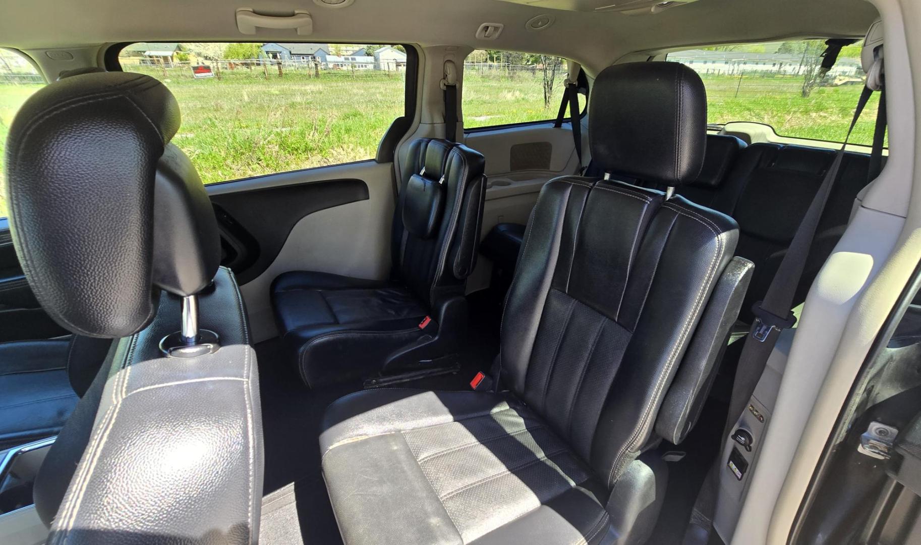2012 Blue /Black Chrysler Town & Country Touring (2C4RC1BG5CR) with an 3.6L V6 DOHC 24V engine, 6-Speed Automatic transmission, located at 450 N Russell, Missoula, MT, 59801, (406) 543-6600, 46.874496, -114.017433 - Excellent Running Mini-Van. Zippy 3.6L V6 Engine. 6 Speed Automatic Transmission. 3rd Row Seating. Air. Cruise. Tilt. Power Windows and Locks. Rear Entertainment. Power Sliding Doors. Power Drivers Seat. AM FM SAT Touch Screen.Bluetooth Audio and Phone. Backup Camera. One small dent in the right fro - Photo#15