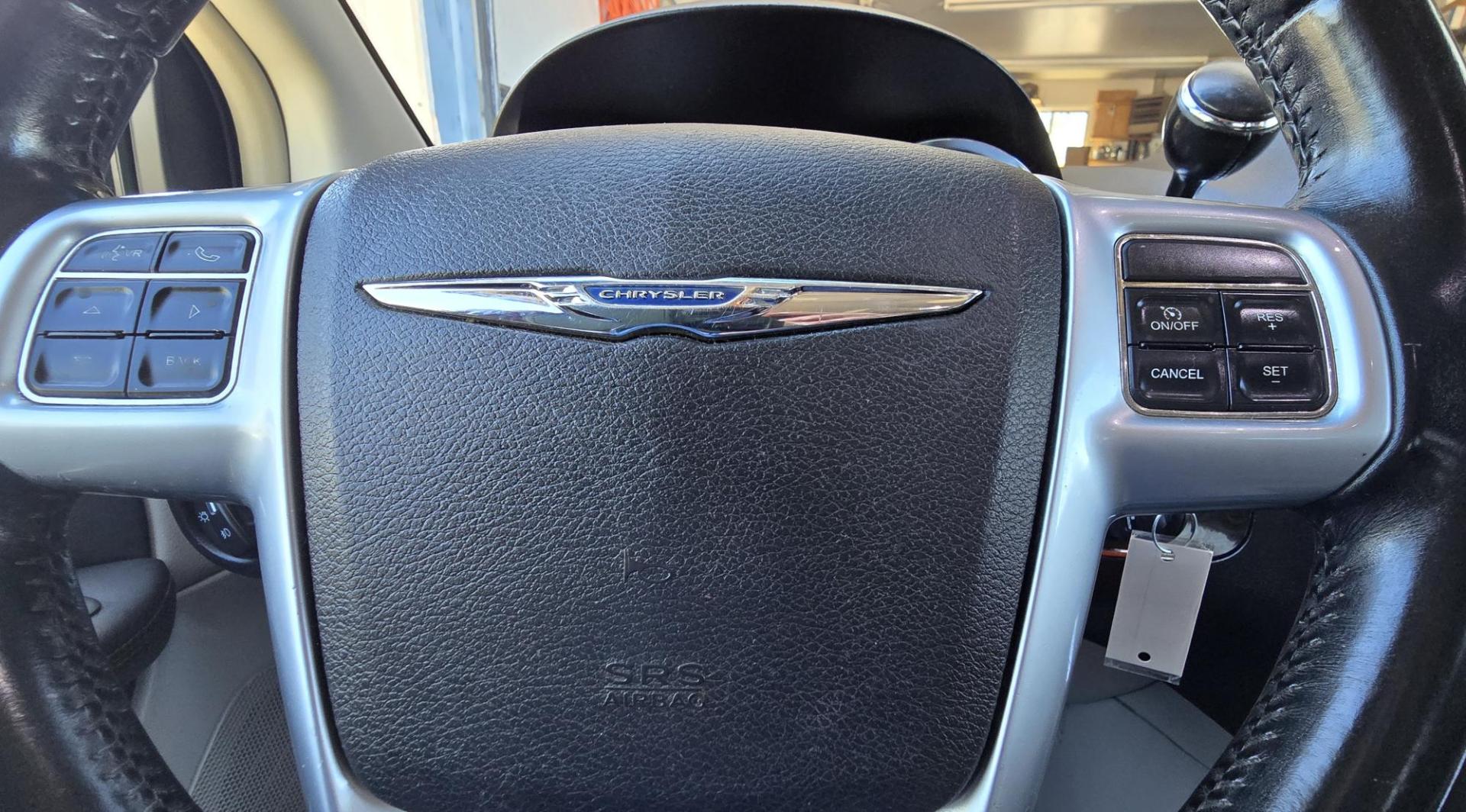 2012 Blue /Black Chrysler Town & Country Touring (2C4RC1BG5CR) with an 3.6L V6 DOHC 24V engine, 6-Speed Automatic transmission, located at 450 N Russell, Missoula, MT, 59801, (406) 543-6600, 46.874496, -114.017433 - Excellent Running Mini-Van. Zippy 3.6L V6 Engine. 6 Speed Automatic Transmission. 3rd Row Seating. Air. Cruise. Tilt. Power Windows and Locks. Rear Entertainment. Power Sliding Doors. Power Drivers Seat. AM FM SAT Touch Screen.Bluetooth Audio and Phone. Backup Camera. One small dent in the right fro - Photo#17