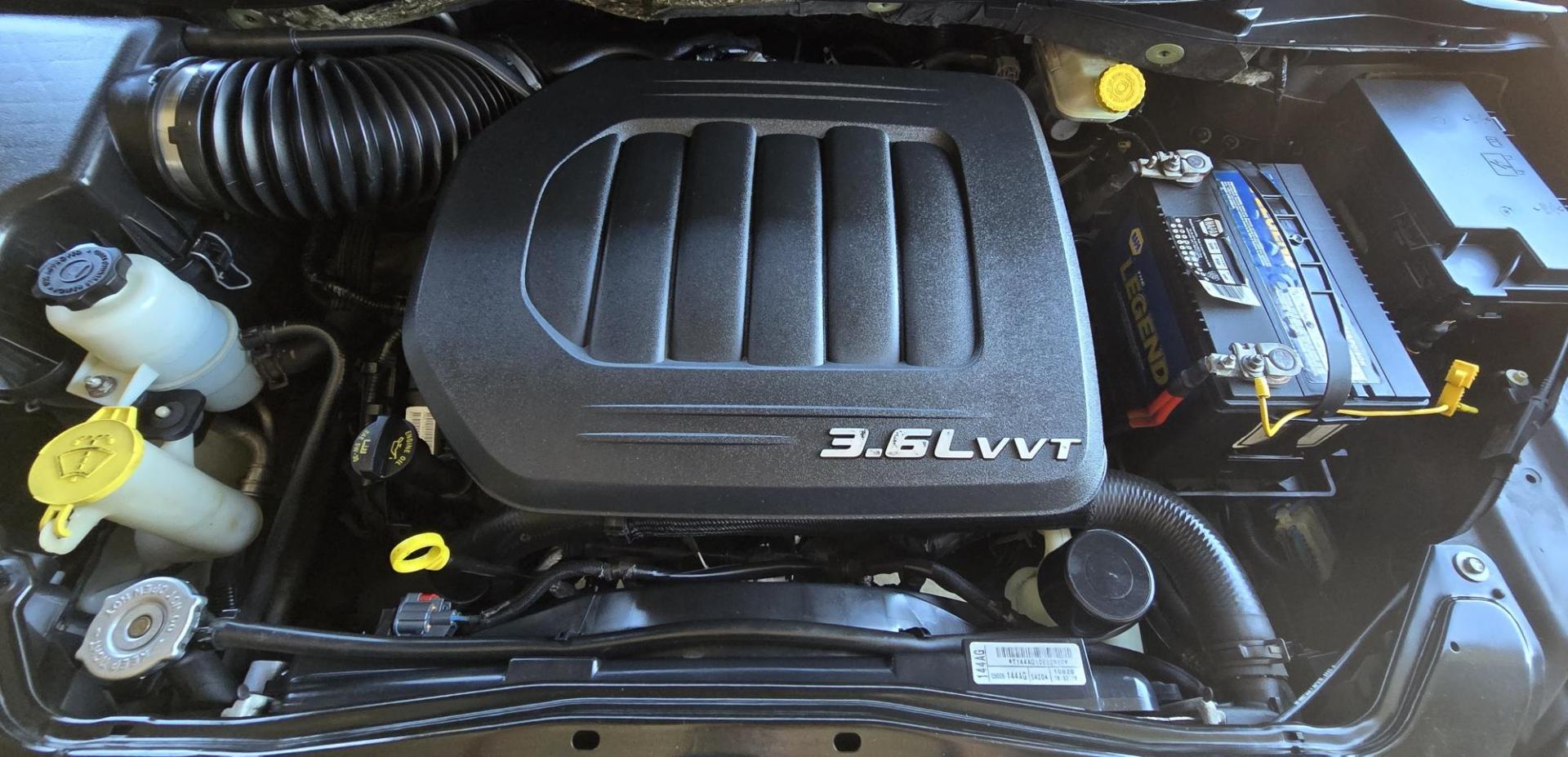 2012 Blue /Black Chrysler Town & Country Touring (2C4RC1BG5CR) with an 3.6L V6 DOHC 24V engine, 6-Speed Automatic transmission, located at 450 N Russell, Missoula, MT, 59801, (406) 543-6600, 46.874496, -114.017433 - Excellent Running Mini-Van. Zippy 3.6L V6 Engine. 6 Speed Automatic Transmission. 3rd Row Seating. Air. Cruise. Tilt. Power Windows and Locks. Rear Entertainment. Power Sliding Doors. Power Drivers Seat. AM FM SAT Touch Screen.Bluetooth Audio and Phone. Backup Camera. One small dent in the right fro - Photo#19