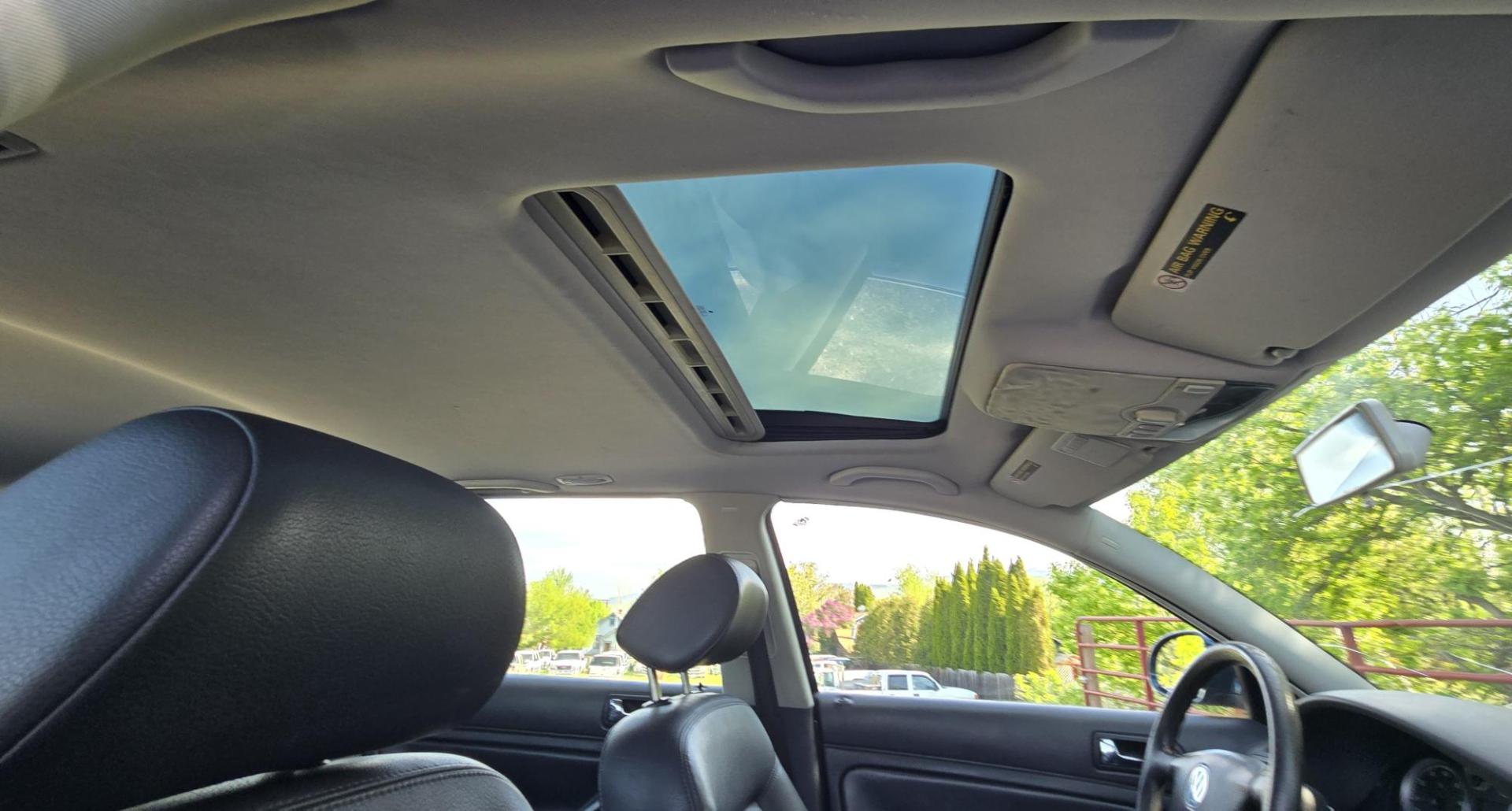 2005 Blue /Black Volkswagen Passat Wagon GLS (WVWDD63B55E) with an 1.8L L4 DOHC 20V TURBO engine, Automatic transmission, located at 450 N Russell, Missoula, MT, 59801, (406) 543-6600, 46.874496, -114.017433 - Strong Running AWD VW Wagon. 1.8L Turbo Engine. Automatic Transmission. Only 116,000 Miles. Air. Cruise. Tilt. Power Windows and Locks. Sunroof. AM FM CD Cassette Player. Heated Front Seats. Clean Title and Carfax. Because of the age, our lenders do NOT offer financing on this vehicle. - Photo#12
