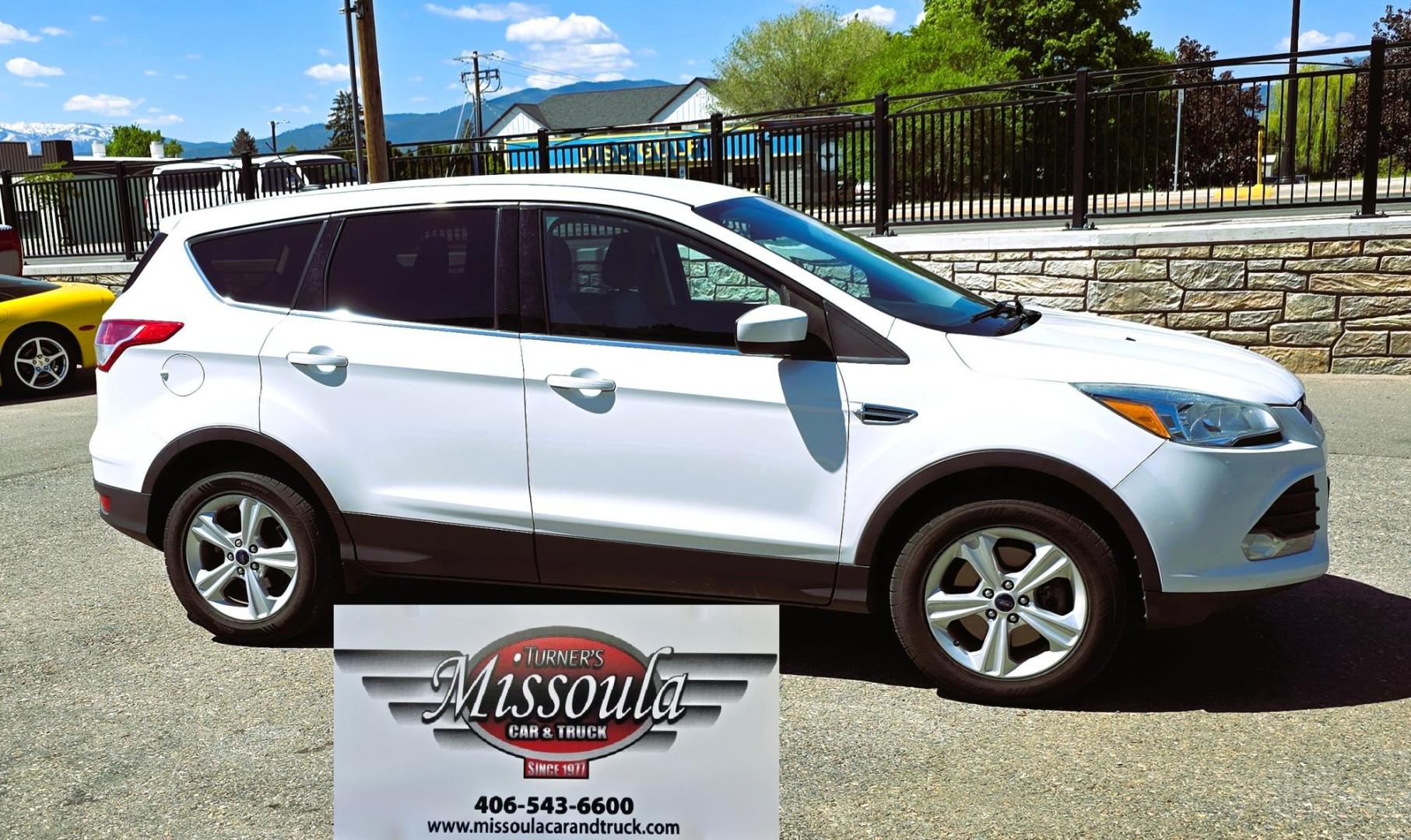 2016 White /Black Ford Escape SE AWD (1FMCU9G92GU) with an 2.0L L4 DOHC 16V engine, 6-Speed Automatic transmission, located at 450 N Russell, Missoula, MT, 59801, (406) 543-6600, 46.874496, -114.017433 - Inexpensive AWD SUV. 2.0L I4 Engine. Automatic Transmission. Air Conditioning. Cruise Control. Tilt Steering. Backup Camera. AM FM CD Player. Bluetooth Audio and Phone Connection. Tires are Excellent. We Finance through local Credit Unions. We do NOT offer In House (Buy Here Pay Here) Financing. - Photo#1