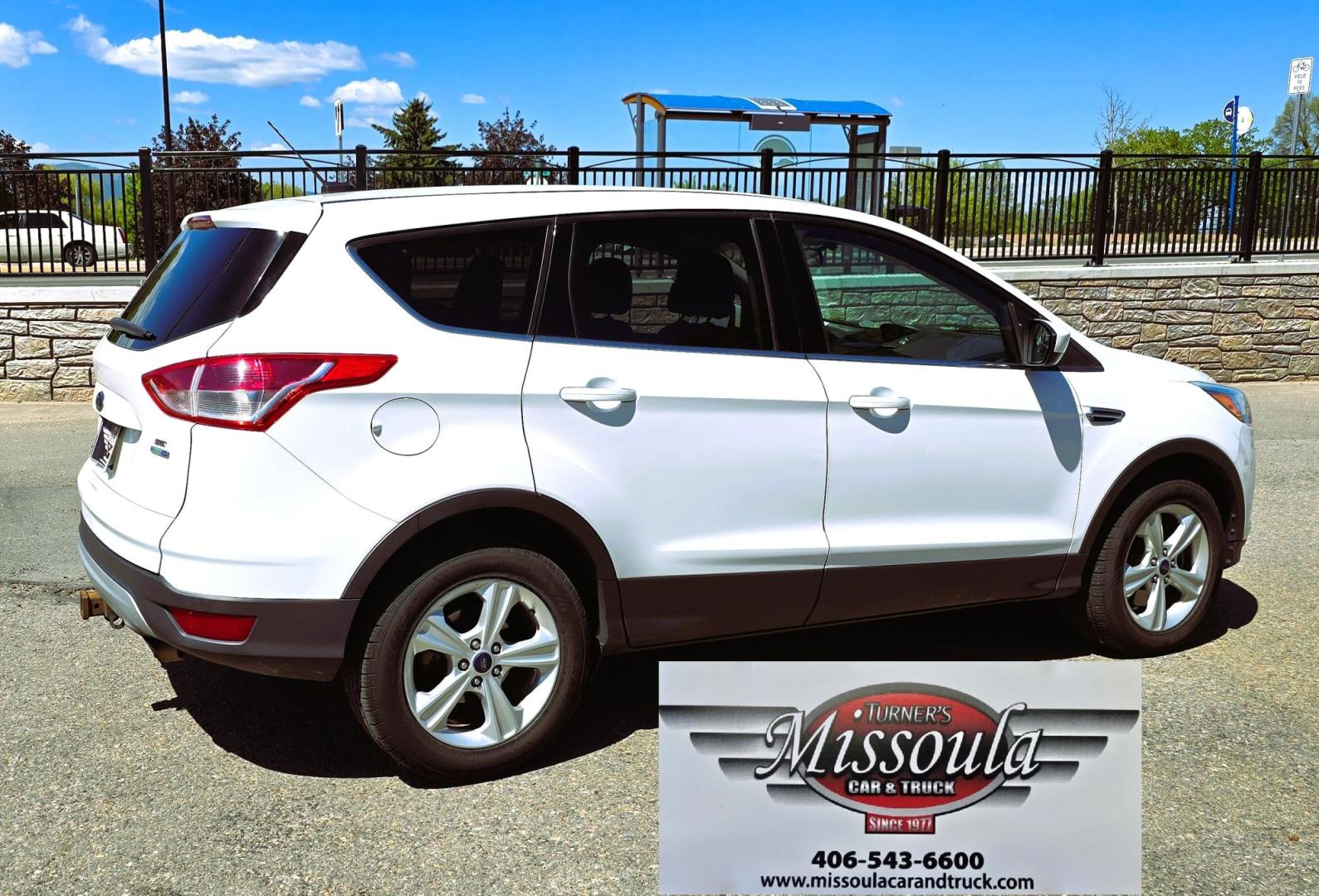 2016 White /Black Ford Escape SE AWD (1FMCU9G92GU) with an 2.0L L4 DOHC 16V engine, 6-Speed Automatic transmission, located at 450 N Russell, Missoula, MT, 59801, (406) 543-6600, 46.874496, -114.017433 - Inexpensive AWD SUV. 2.0L I4 Engine. Automatic Transmission. Air Conditioning. Cruise Control. Tilt Steering. Backup Camera. AM FM CD Player. Bluetooth Audio and Phone Connection. Tires are Excellent. We Finance through local Credit Unions. We do NOT offer In House (Buy Here Pay Here) Financing. - Photo#2