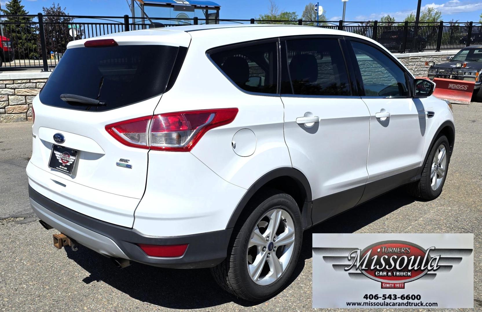 2016 White /Black Ford Escape SE AWD (1FMCU9G92GU) with an 2.0L L4 DOHC 16V engine, 6-Speed Automatic transmission, located at 450 N Russell, Missoula, MT, 59801, (406) 543-6600, 46.874496, -114.017433 - Inexpensive AWD SUV. 2.0L I4 Engine. Automatic Transmission. Air Conditioning. Cruise Control. Tilt Steering. Backup Camera. AM FM CD Player. Bluetooth Audio and Phone Connection. Tires are Excellent. We Finance through local Credit Unions. We do NOT offer In House (Buy Here Pay Here) Financing. - Photo#3