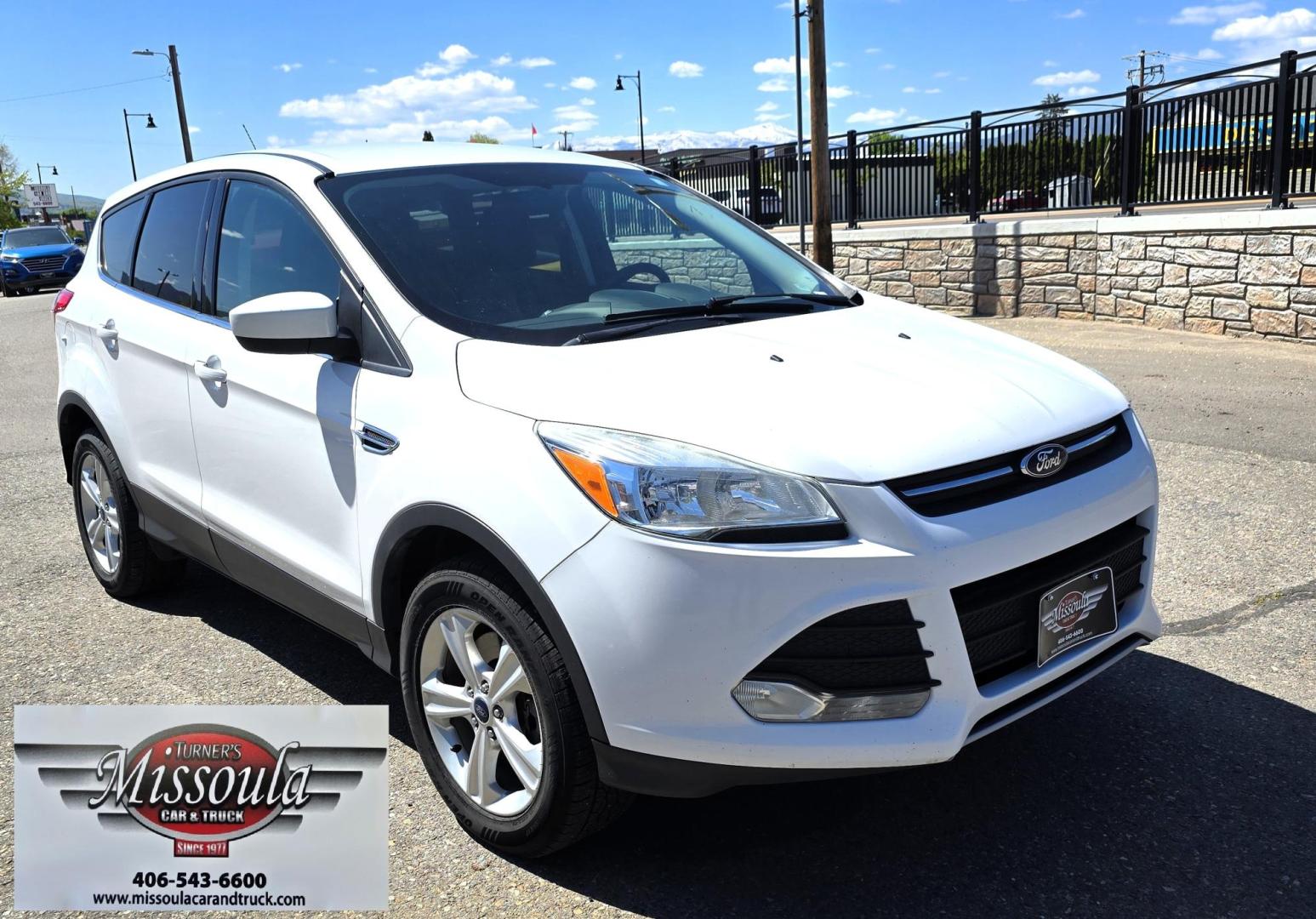 2016 White /Black Ford Escape SE AWD (1FMCU9G92GU) with an 2.0L L4 DOHC 16V engine, 6-Speed Automatic transmission, located at 450 N Russell, Missoula, MT, 59801, (406) 543-6600, 46.874496, -114.017433 - Inexpensive AWD SUV. 2.0L I4 Engine. Automatic Transmission. Air Conditioning. Cruise Control. Tilt Steering. Backup Camera. AM FM CD Player. Bluetooth Audio and Phone Connection. Tires are Excellent. We Finance through local Credit Unions. We do NOT offer In House (Buy Here Pay Here) Financing. - Photo#5