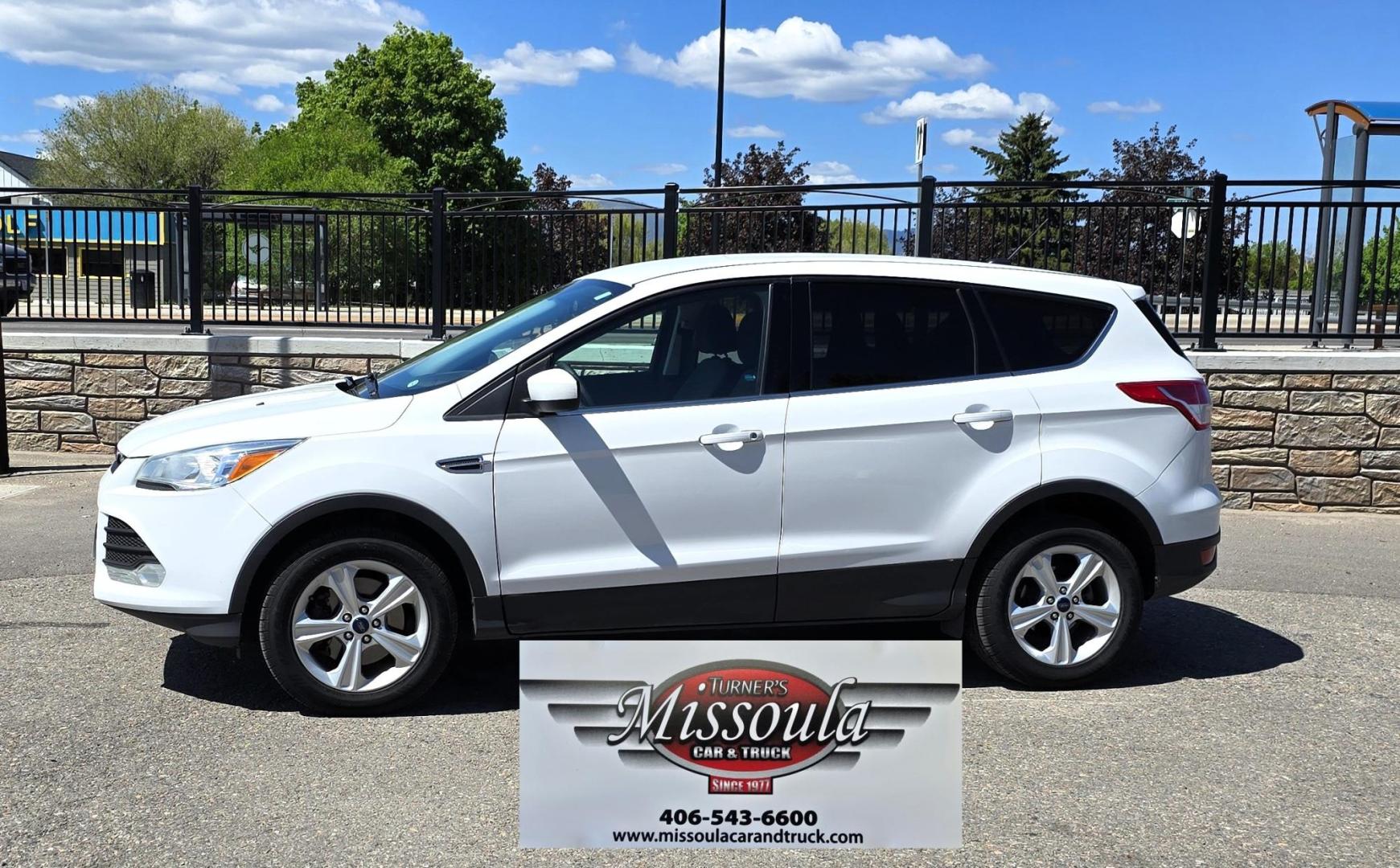 2016 White /Black Ford Escape SE AWD (1FMCU9G92GU) with an 2.0L L4 DOHC 16V engine, 6-Speed Automatic transmission, located at 450 N Russell, Missoula, MT, 59801, (406) 543-6600, 46.874496, -114.017433 - Inexpensive AWD SUV. 2.0L I4 Engine. Automatic Transmission. Air Conditioning. Cruise Control. Tilt Steering. Backup Camera. AM FM CD Player. Bluetooth Audio and Phone Connection. Tires are Excellent. We Finance through local Credit Unions. We do NOT offer In House (Buy Here Pay Here) Financing. - Photo#6