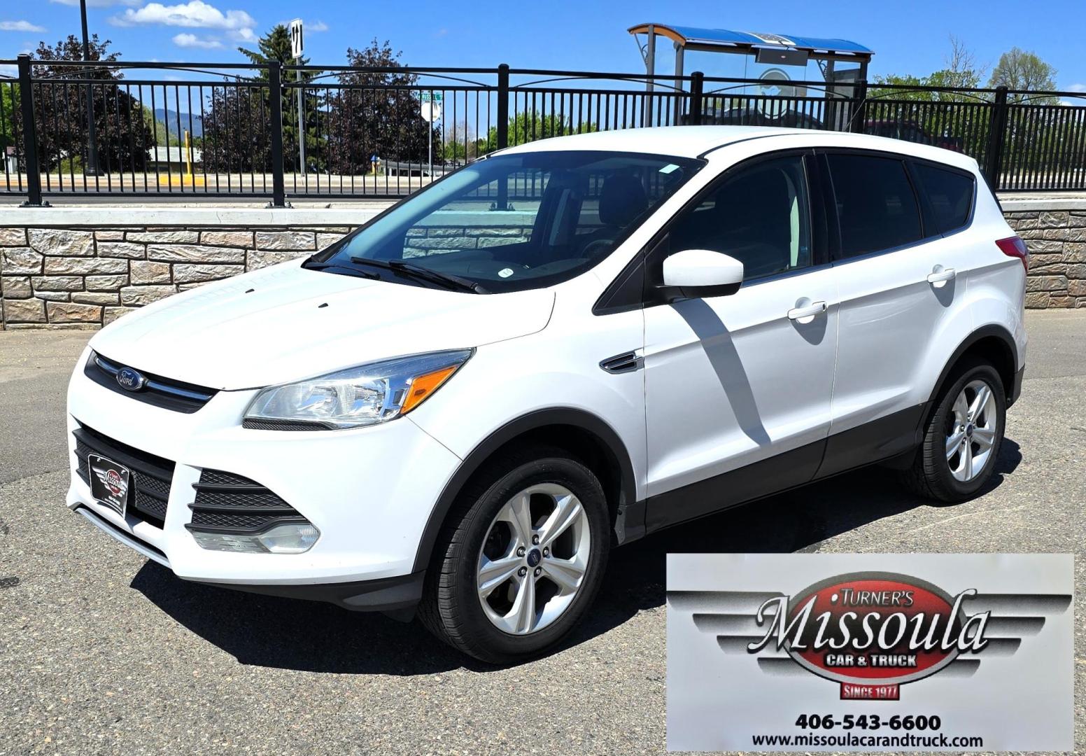 2016 White /Black Ford Escape SE AWD (1FMCU9G92GU) with an 2.0L L4 DOHC 16V engine, 6-Speed Automatic transmission, located at 450 N Russell, Missoula, MT, 59801, (406) 543-6600, 46.874496, -114.017433 - Inexpensive AWD SUV. 2.0L I4 Engine. Automatic Transmission. Air Conditioning. Cruise Control. Tilt Steering. Backup Camera. AM FM CD Player. Bluetooth Audio and Phone Connection. Tires are Excellent. We Finance through local Credit Unions. We do NOT offer In House (Buy Here Pay Here) Financing. - Photo#7