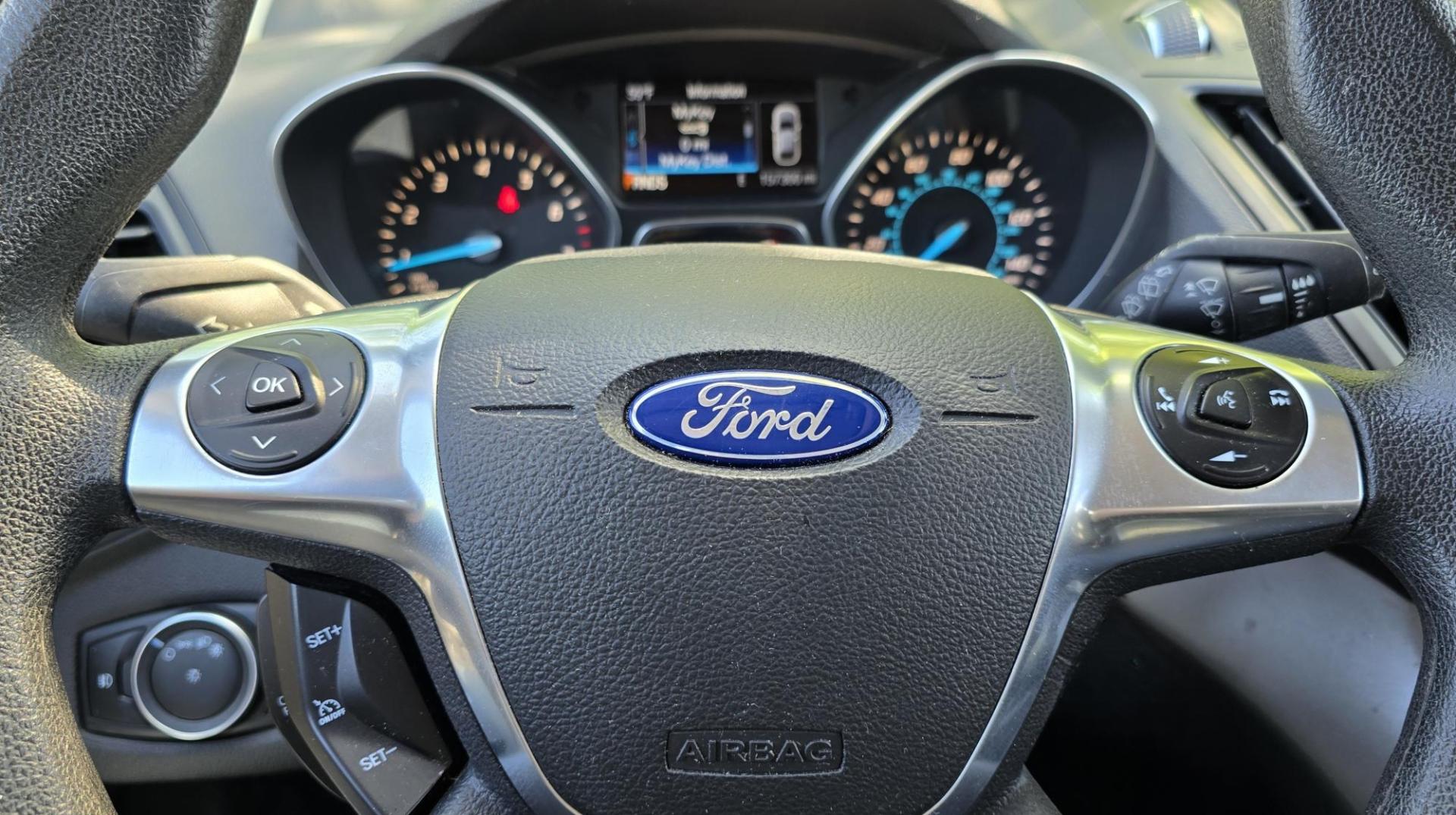 2016 White /Black Ford Escape SE AWD (1FMCU9G92GU) with an 2.0L L4 DOHC 16V engine, 6-Speed Automatic transmission, located at 450 N Russell, Missoula, MT, 59801, (406) 543-6600, 46.874496, -114.017433 - Inexpensive AWD SUV. 2.0L I4 Engine. Automatic Transmission. Air Conditioning. Cruise Control. Tilt Steering. Backup Camera. AM FM CD Player. Bluetooth Audio and Phone Connection. Tires are Excellent. We Finance through local Credit Unions. We do NOT offer In House (Buy Here Pay Here) Financing. - Photo#9