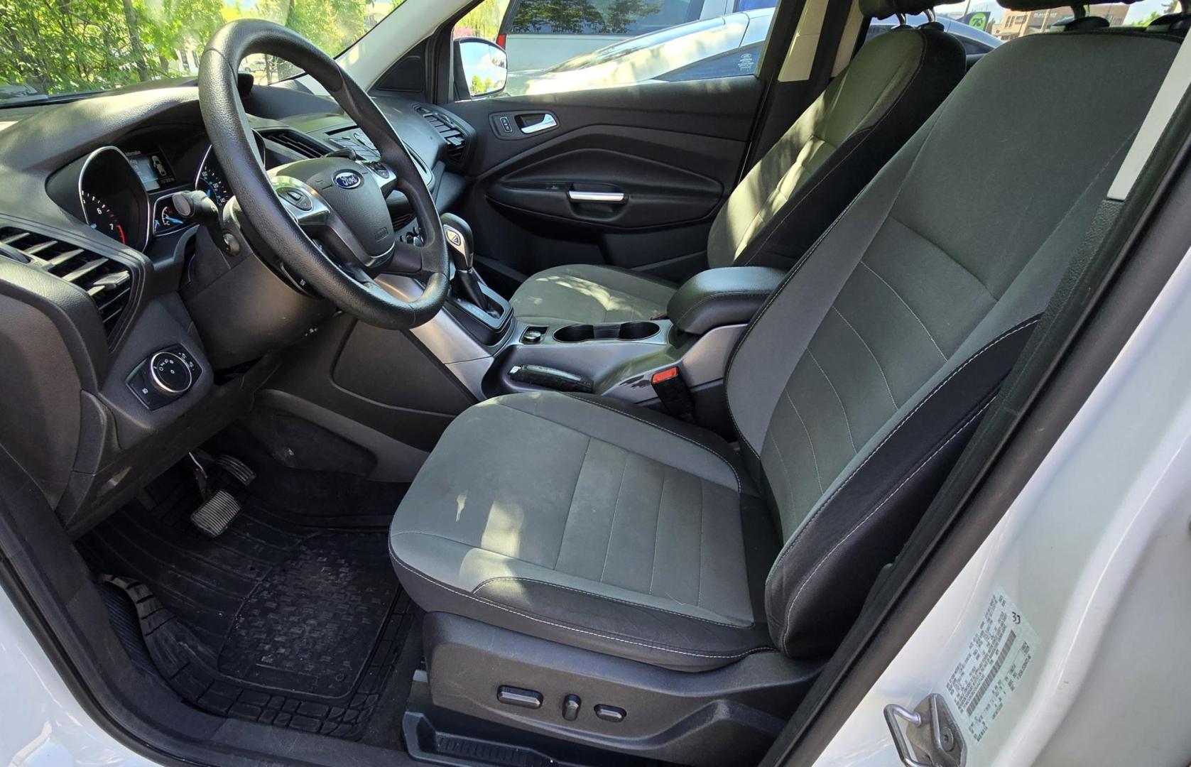 2016 White /Black Ford Escape SE AWD (1FMCU9G92GU) with an 2.0L L4 DOHC 16V engine, 6-Speed Automatic transmission, located at 450 N Russell, Missoula, MT, 59801, (406) 543-6600, 46.874496, -114.017433 - Inexpensive AWD SUV. 2.0L I4 Engine. Automatic Transmission. Air Conditioning. Cruise Control. Tilt Steering. Backup Camera. AM FM CD Player. Bluetooth Audio and Phone Connection. Tires are Excellent. We Finance through local Credit Unions. We do NOT offer In House (Buy Here Pay Here) Financing. - Photo#13