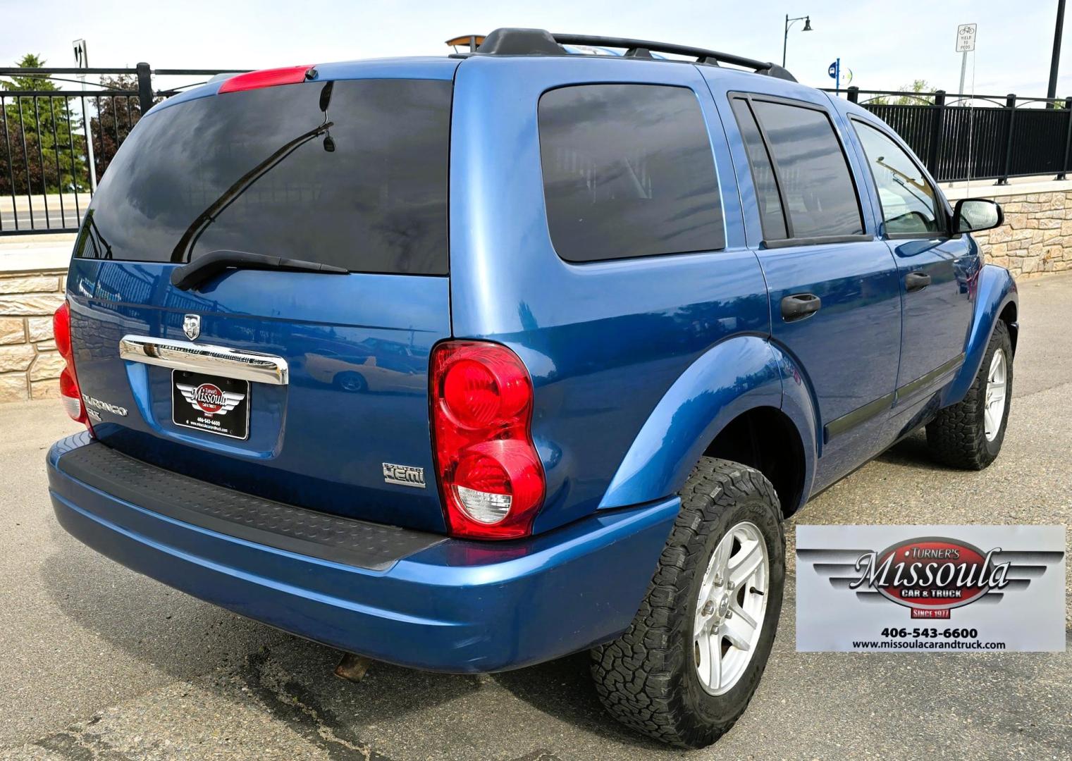 2005 Blue /Gray Dodge Durango Adventurer Model 2WD (1D4HD48D95F) with an 5.7L V8 OHV 16V engine, 5-Speed Automatic Overdrive transmission, located at 450 N Russell, Missoula, MT, 59801, (406) 543-6600, 46.874496, -114.017433 - Yup, It's got a Hemi! Roomy Rear Wheel Drive SUV with 3rd Row Seating. Air Conditioning was just serviced. Cruise Control. Power Windows and Locks. AM FM CD Player. Like New BF Goodrich Tires. Does have a small blemish on the left rear quarter panel. Clean Title and Carfax. Because of the age, ou - Photo#4