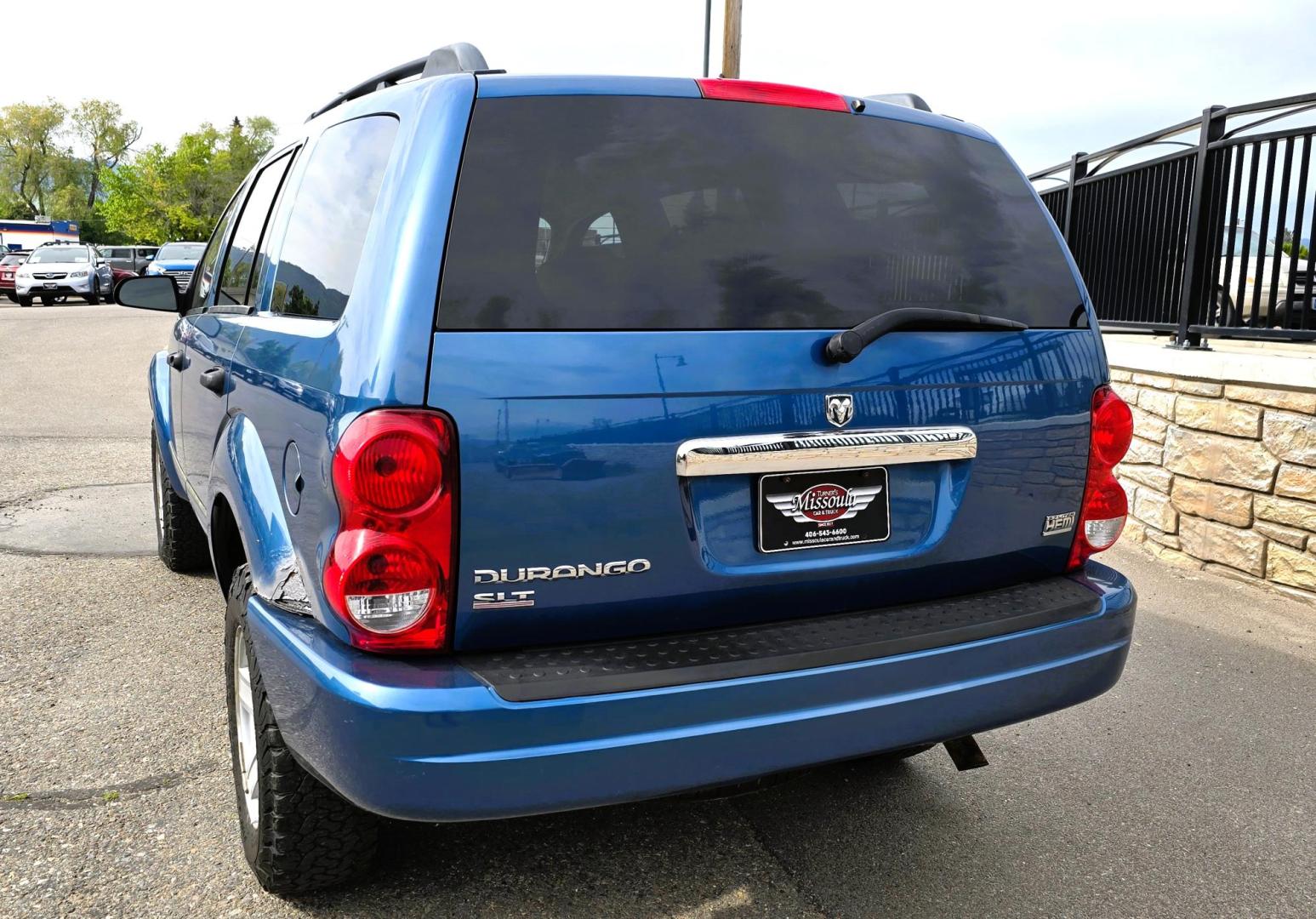 2005 Blue /Gray Dodge Durango Adventurer Model 2WD (1D4HD48D95F) with an 5.7L V8 OHV 16V engine, 5-Speed Automatic Overdrive transmission, located at 450 N Russell, Missoula, MT, 59801, (406) 543-6600, 46.874496, -114.017433 - Yup, It's got a Hemi! Roomy Rear Wheel Drive SUV with 3rd Row Seating. Air Conditioning was just serviced. Cruise Control. Power Windows and Locks. AM FM CD Player. Like New BF Goodrich Tires. Does have a small blemish on the left rear quarter panel. Clean Title and Carfax. Because of the age, ou - Photo#9