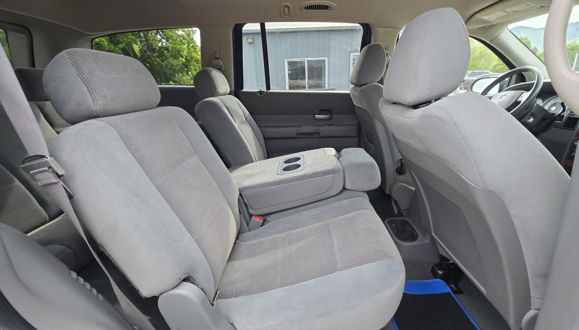 2005 Blue /Gray Dodge Durango Adventurer Model 2WD (1D4HD48D95F) with an 5.7L V8 OHV 16V engine, 5-Speed Automatic Overdrive transmission, located at 450 N Russell, Missoula, MT, 59801, (406) 543-6600, 46.874496, -114.017433 - Yup, It's got a Hemi! Roomy Rear Wheel Drive SUV with 3rd Row Seating. Air Conditioning was just serviced. Cruise Control. Power Windows and Locks. AM FM CD Player. Like New BF Goodrich Tires. Does have a small blemish on the left rear quarter panel. Clean Title and Carfax. Because of the age, ou - Photo#12