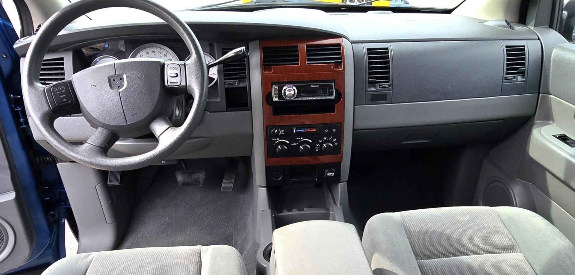 2005 Blue /Gray Dodge Durango Adventurer Model 2WD (1D4HD48D95F) with an 5.7L V8 OHV 16V engine, 5-Speed Automatic Overdrive transmission, located at 450 N Russell, Missoula, MT, 59801, (406) 543-6600, 46.874496, -114.017433 - Yup, It's got a Hemi! Roomy Rear Wheel Drive SUV with 3rd Row Seating. Air Conditioning was just serviced. Cruise Control. Power Windows and Locks. AM FM CD Player. Like New BF Goodrich Tires. Does have a small blemish on the left rear quarter panel. Clean Title and Carfax. Because of the age, ou - Photo#16
