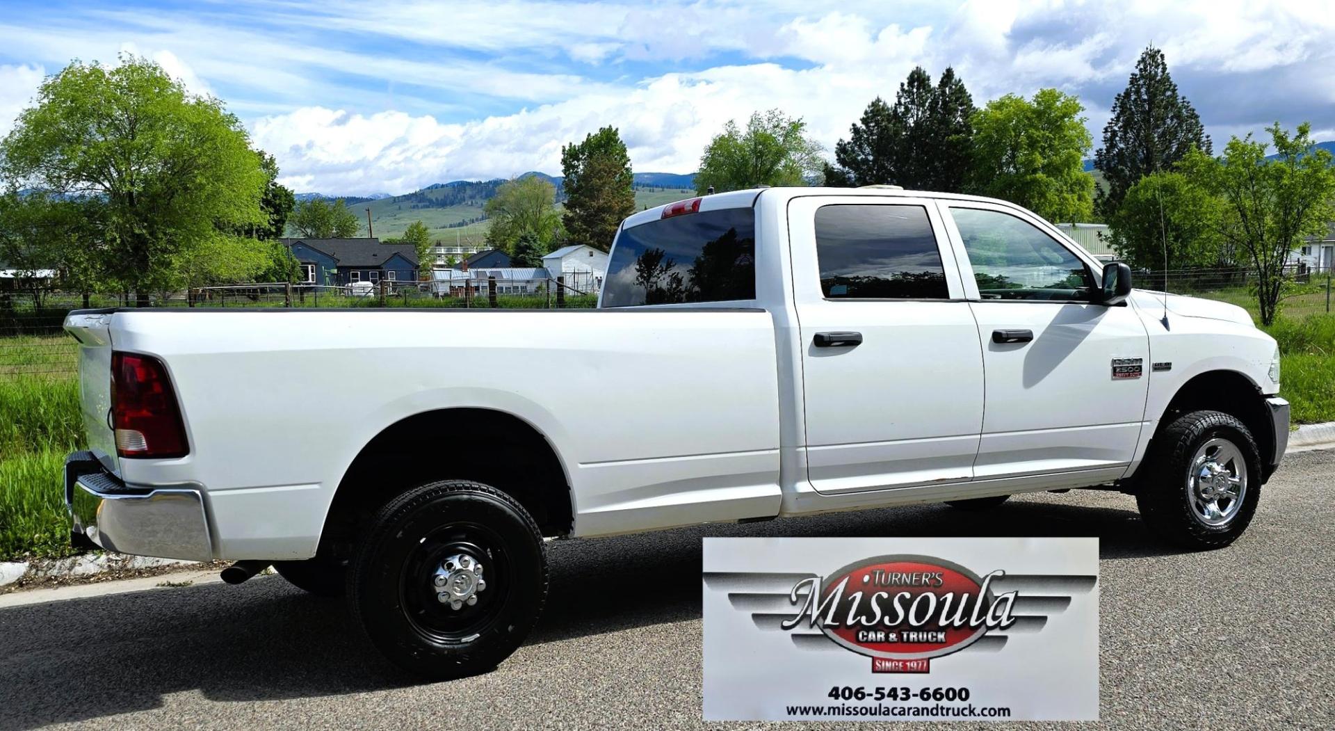 2012 White /Black Dodge Ram 2500 ST Crew Cab LWB 4WD (3C6TD5HT6CG) with an 5.7L V8 OHV 16V engine, 6-Speed Automatic transmission, located at 450 N Russell, Missoula, MT, 59801, (406) 543-6600, 46.874496, -114.017433 - Long Box Crew Cab 3/4 Ton 4WD with 5.7 Hemi. 6 Speed Automatic Transmission. Air. Cruise. Tilt. Power Windows and Locks. AM FM SAT CD Player. Built in Trailer Brake. This truck runs and drives amazing. Has a few very light dings. We Finance through local Credit Unions. We do NOT offer In House ( - Photo#1