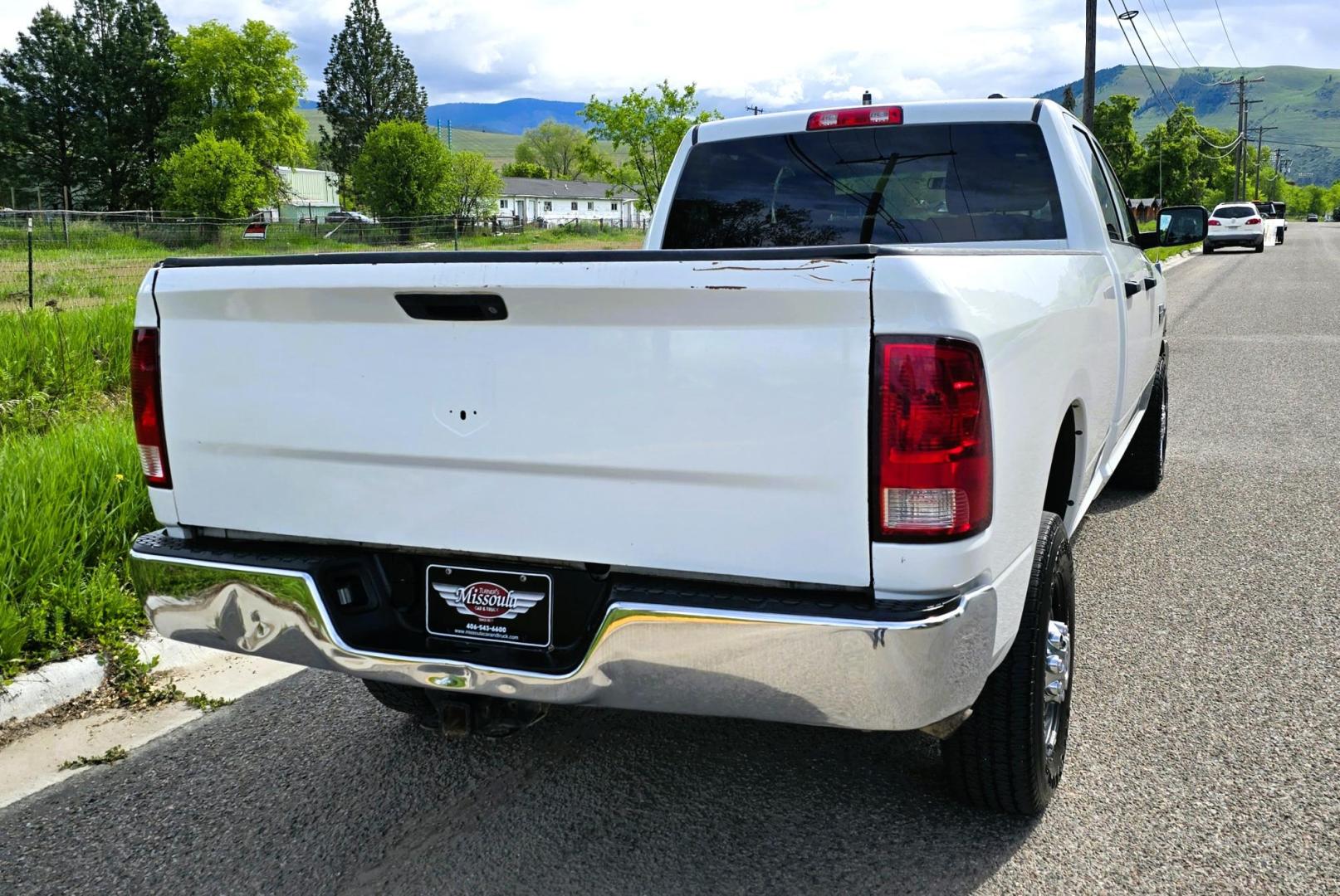 2012 White /Black Dodge Ram 2500 ST Crew Cab LWB 4WD (3C6TD5HT6CG) with an 5.7L V8 OHV 16V engine, 6-Speed Automatic transmission, located at 450 N Russell, Missoula, MT, 59801, (406) 543-6600, 46.874496, -114.017433 - Long Box Crew Cab 3/4 Ton 4WD with 5.7 Hemi. 6 Speed Automatic Transmission. Air. Cruise. Tilt. Power Windows and Locks. AM FM SAT CD Player. Built in Trailer Brake. This truck runs and drives amazing. Has a few very light dings. We Finance through local Credit Unions. We do NOT offer In House ( - Photo#5