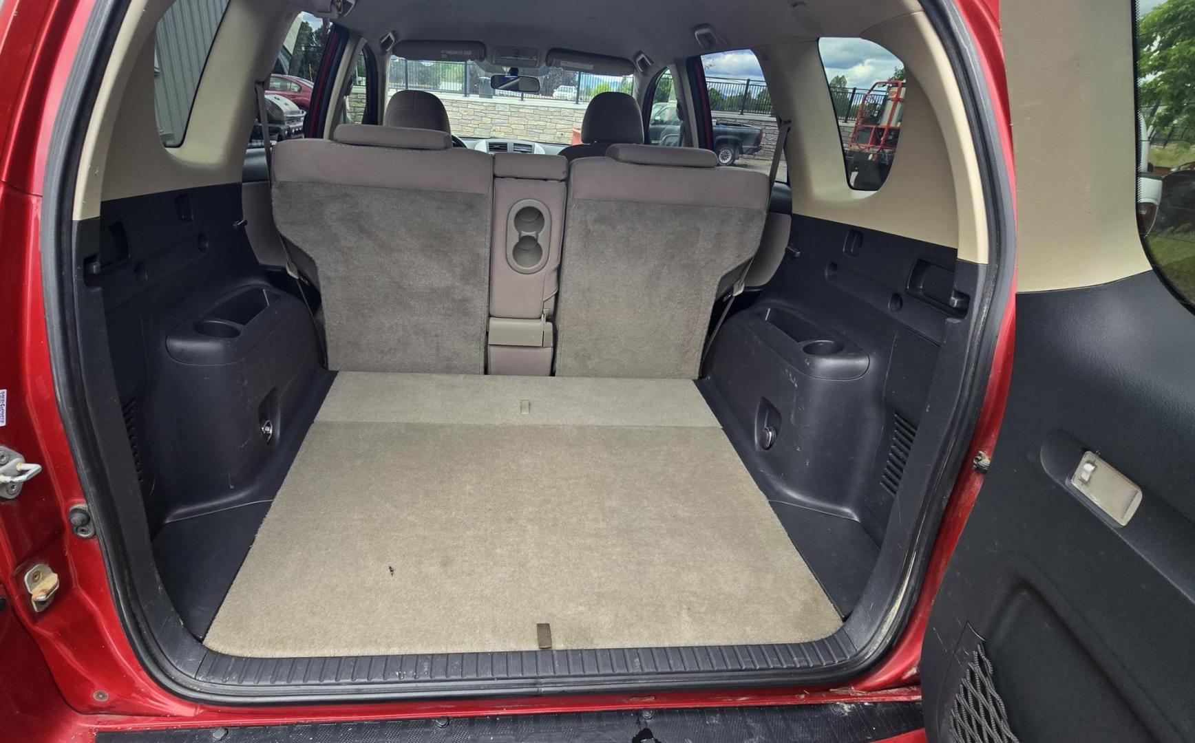 2007 Red /Tan Toyota RAV4 Base I4 4WD (JTMBD33V075) with an 2.4L L4 DOHC 16V engine, 4-Speed Automatic transmission, located at 450 N Russell, Missoula, MT, 59801, (406) 543-6600, 46.874496, -114.017433 - Reliable Toyota AWD. 2.4L I4 Engine. Automatic Transmission. Freezing Cold Air Conditioning. Cruise Control. Tilt Steering. AM FM CD Player. Power Windows and Locks. Has a Clean Title and Carfax. We Finance through local Credit Unions. We do NOT offer In House (Buy Here Pay Here) Financing. - Photo#13